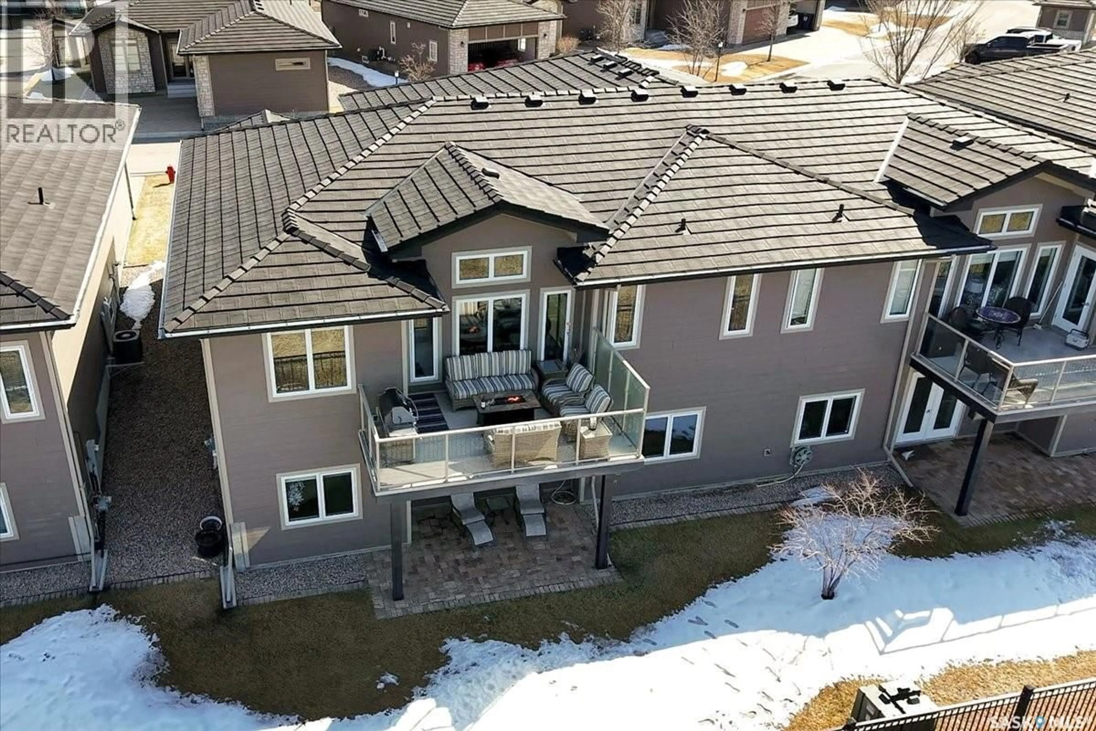 A pic from outside/outdoor area/front of a property/back of a property/a pic from drone, unknown for 22 315 LEDINGHAM DRIVE, Saskatoon Saskatchewan S7V0J1