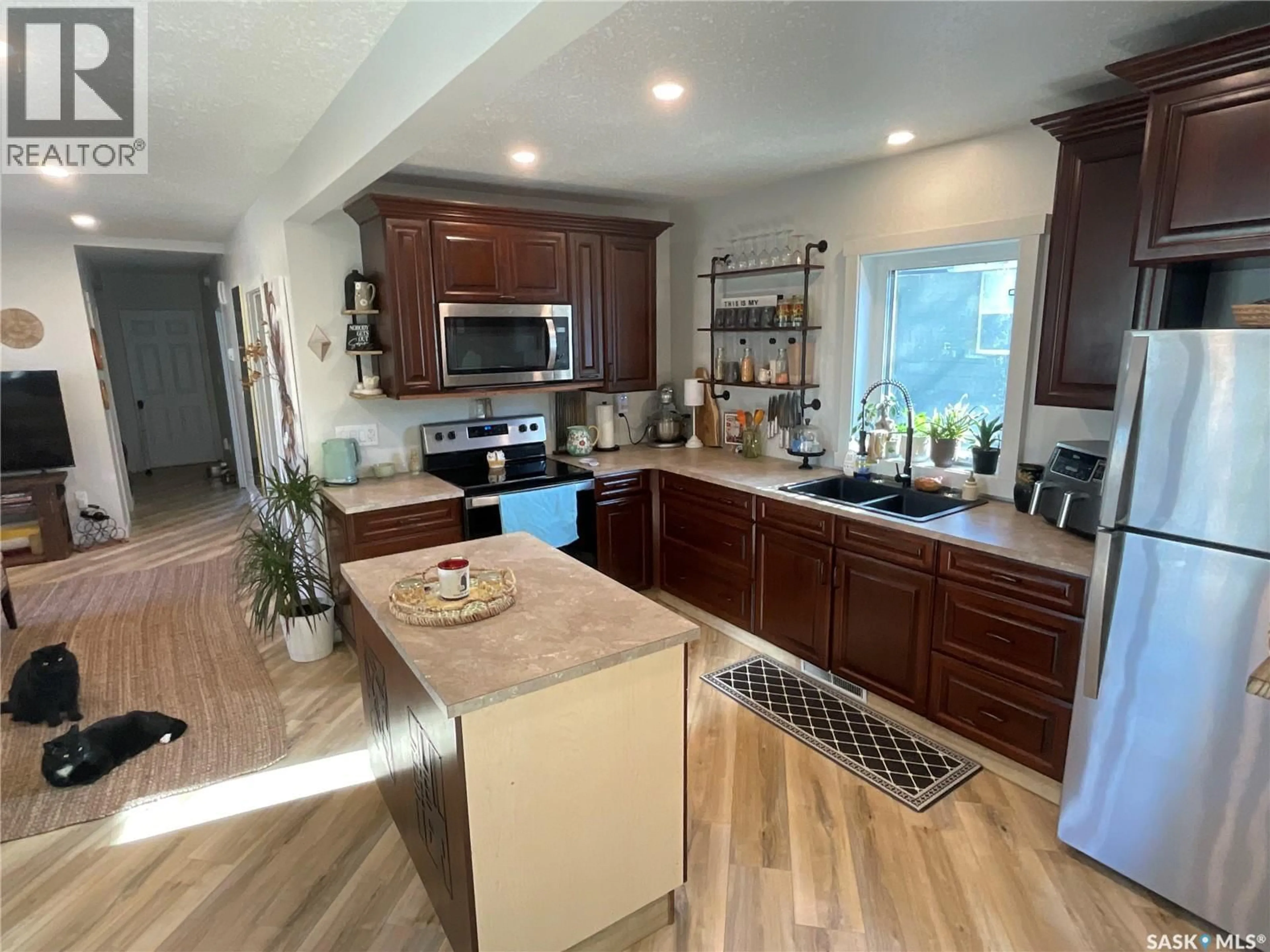 Open concept kitchen, ceramic/tile floor for 112 3RD STREET, Wakaw Saskatchewan S0K4P0