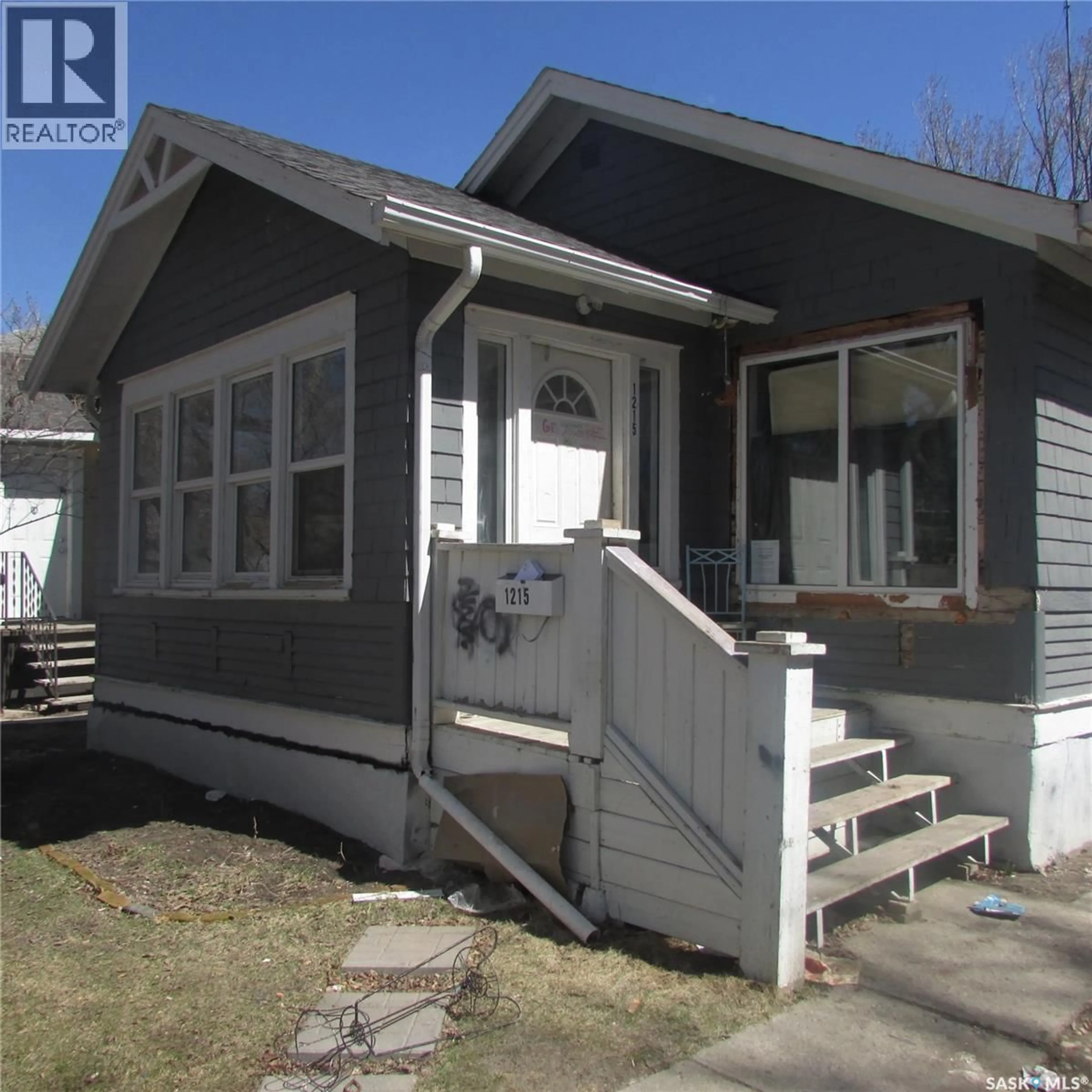 Home with vinyl exterior material, street for 1215 CAMERON STREET, Regina Saskatchewan S4T2T1