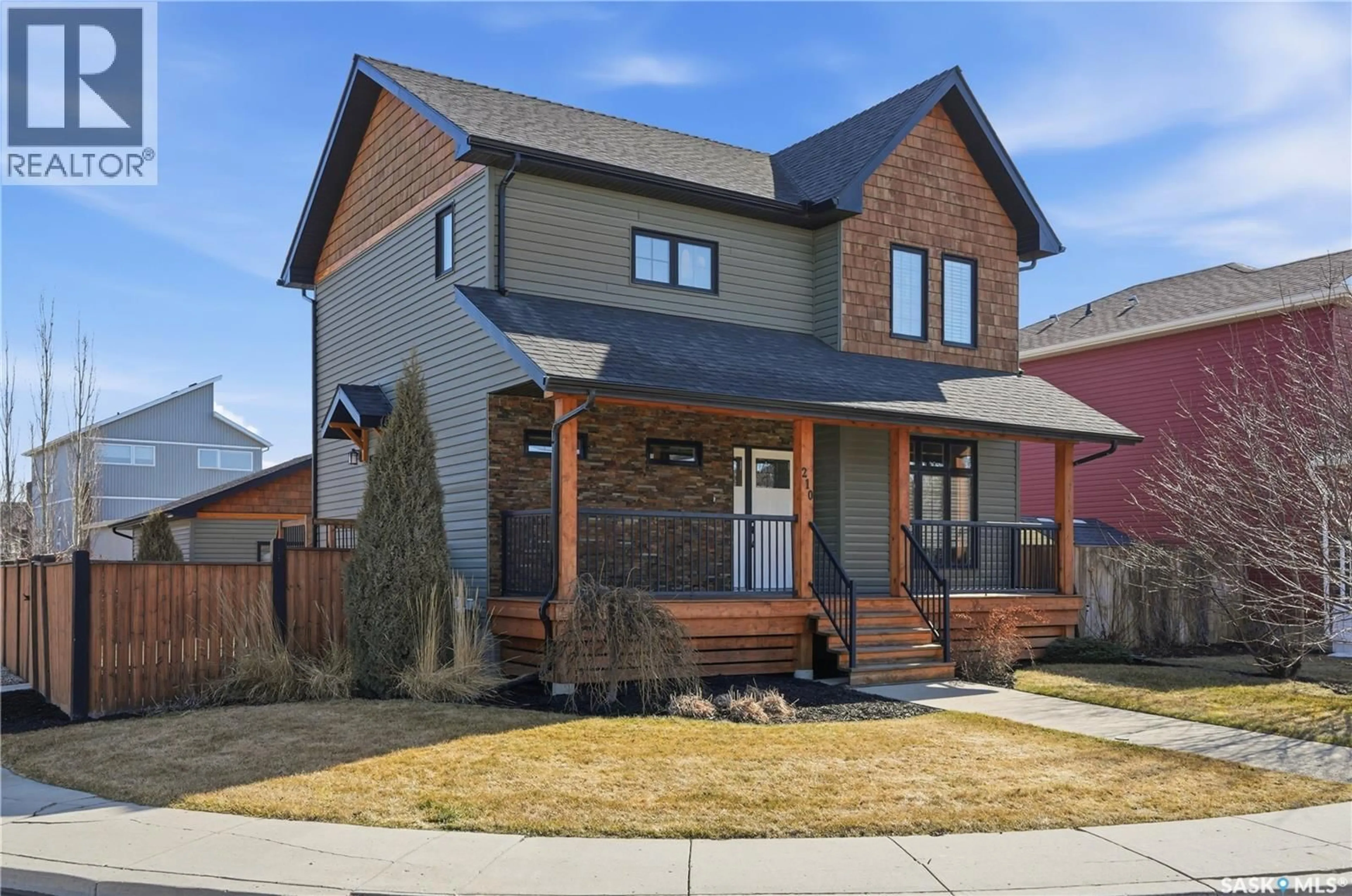 Home with brick exterior material, street for 210 PADGET CRESCENT, Saskatoon Saskatchewan S7W0H4