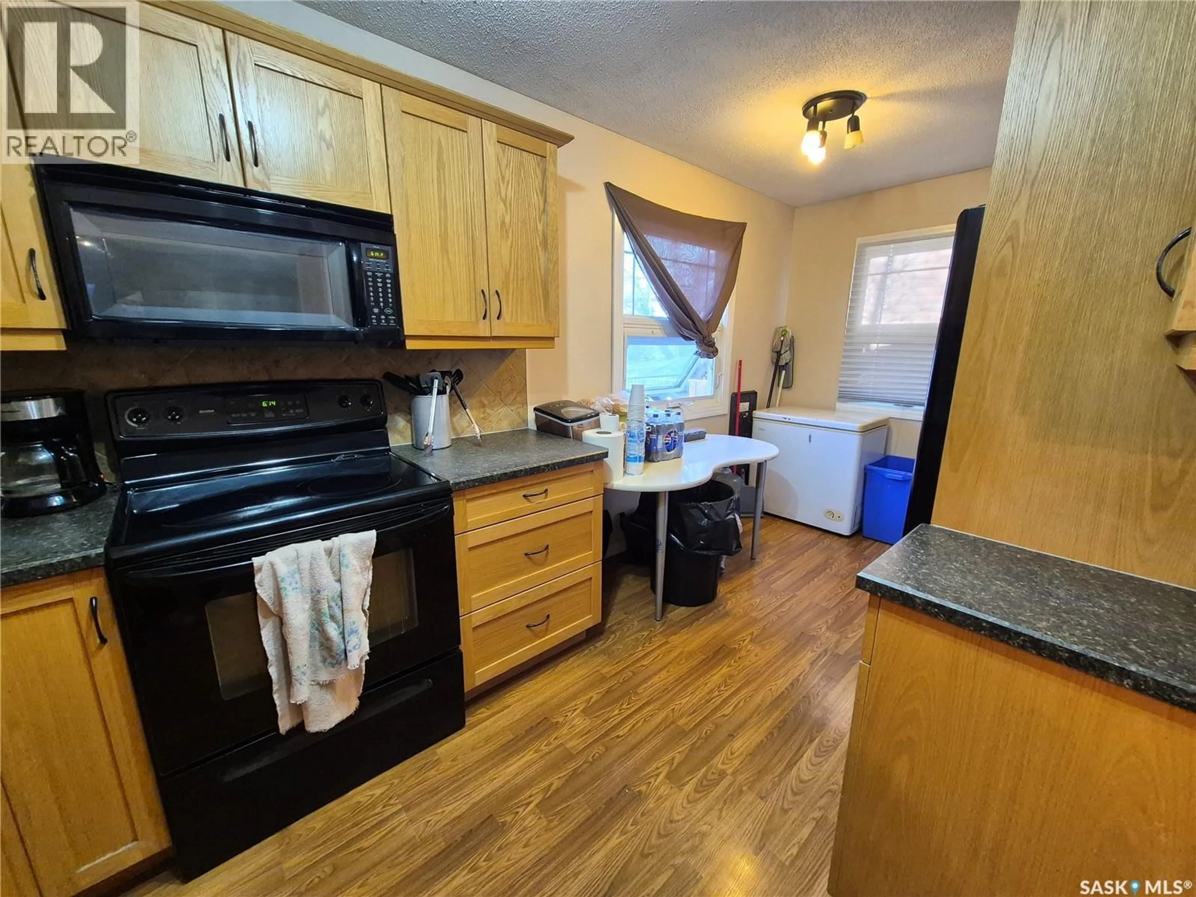 Standard kitchen, wood/laminate floor for 1118 PARK AVENUE, Weyburn Saskatchewan S4H0K5