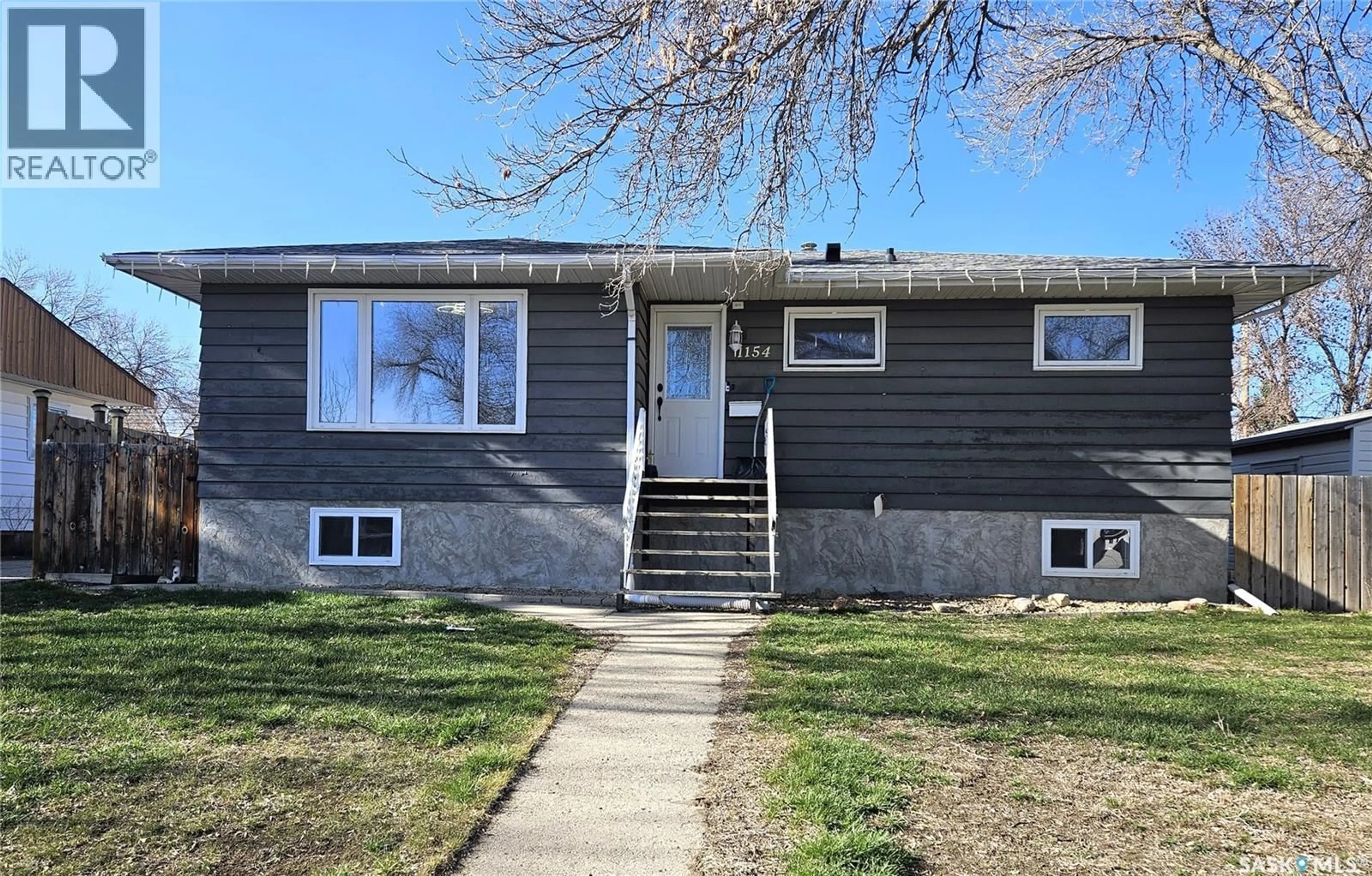 Home with vinyl exterior material, street for 1154 CARIBOU STREET, Moose Jaw Saskatchewan S6H2B5
