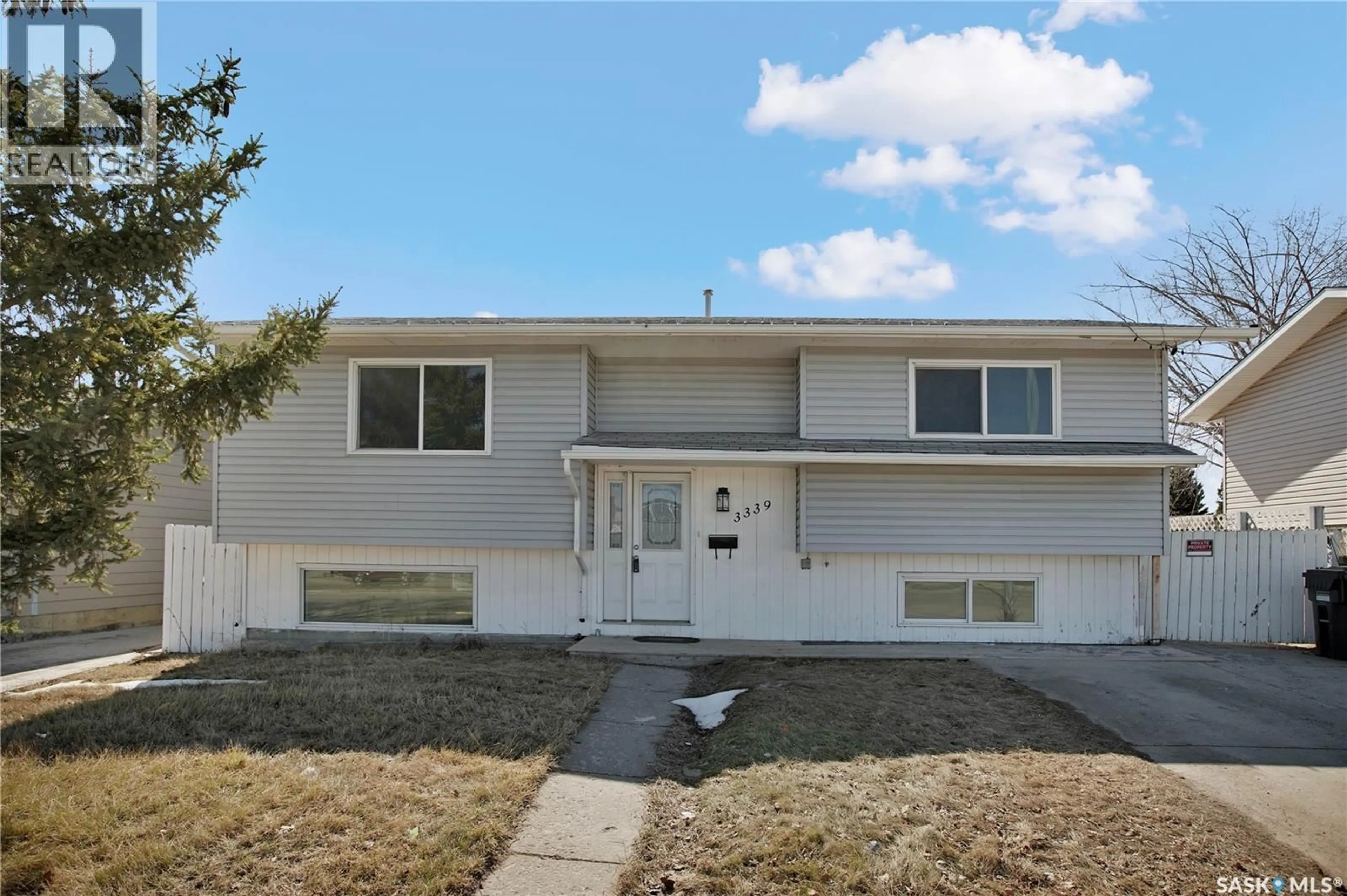 Home with vinyl exterior material, street for 3339 FAIRLIGHT DRIVE, Saskatoon Saskatchewan S7M4N1