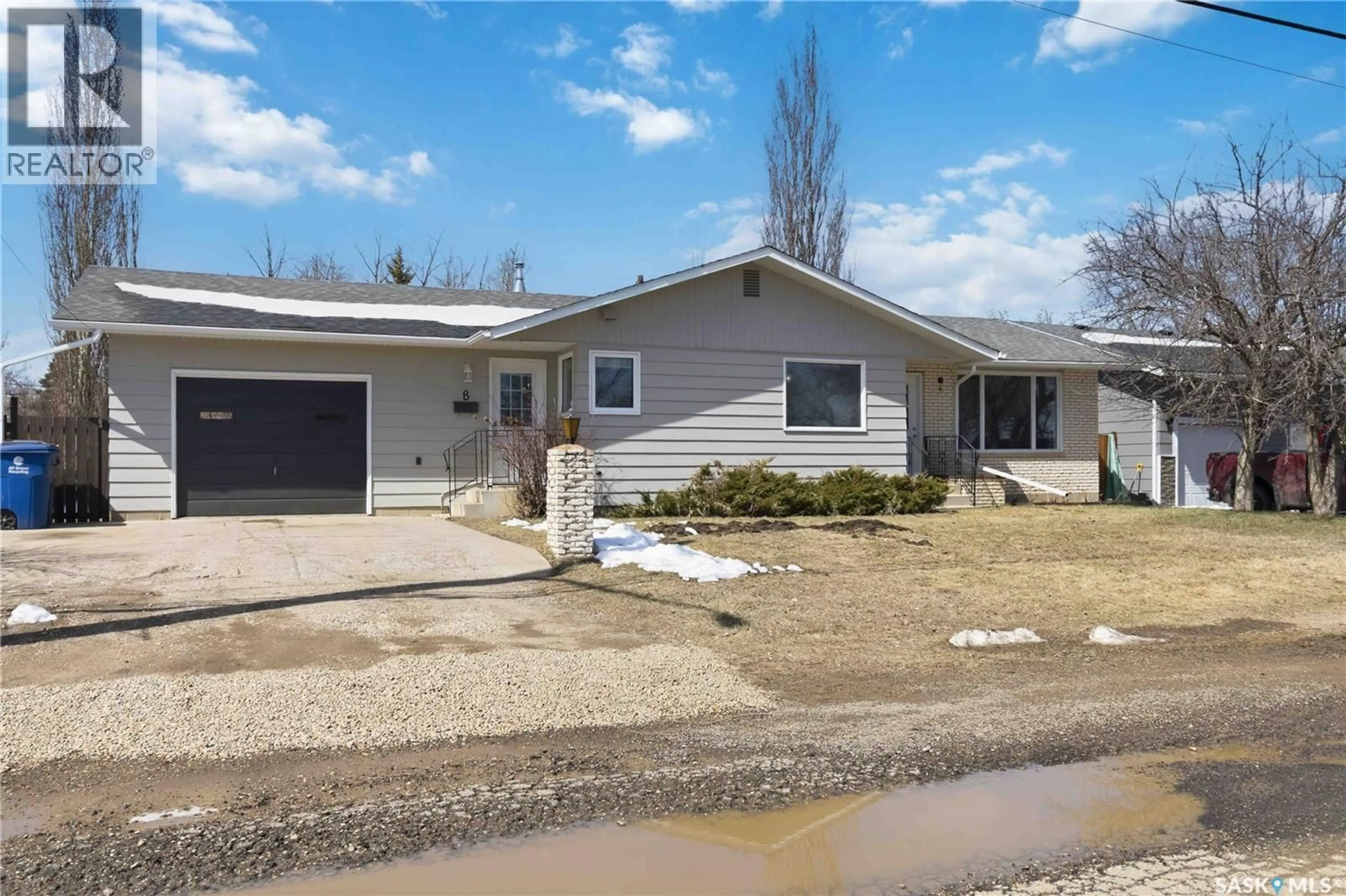 Home with vinyl exterior material, street for 8 PARK AVENUE, Langham Saskatchewan S0K2L0
