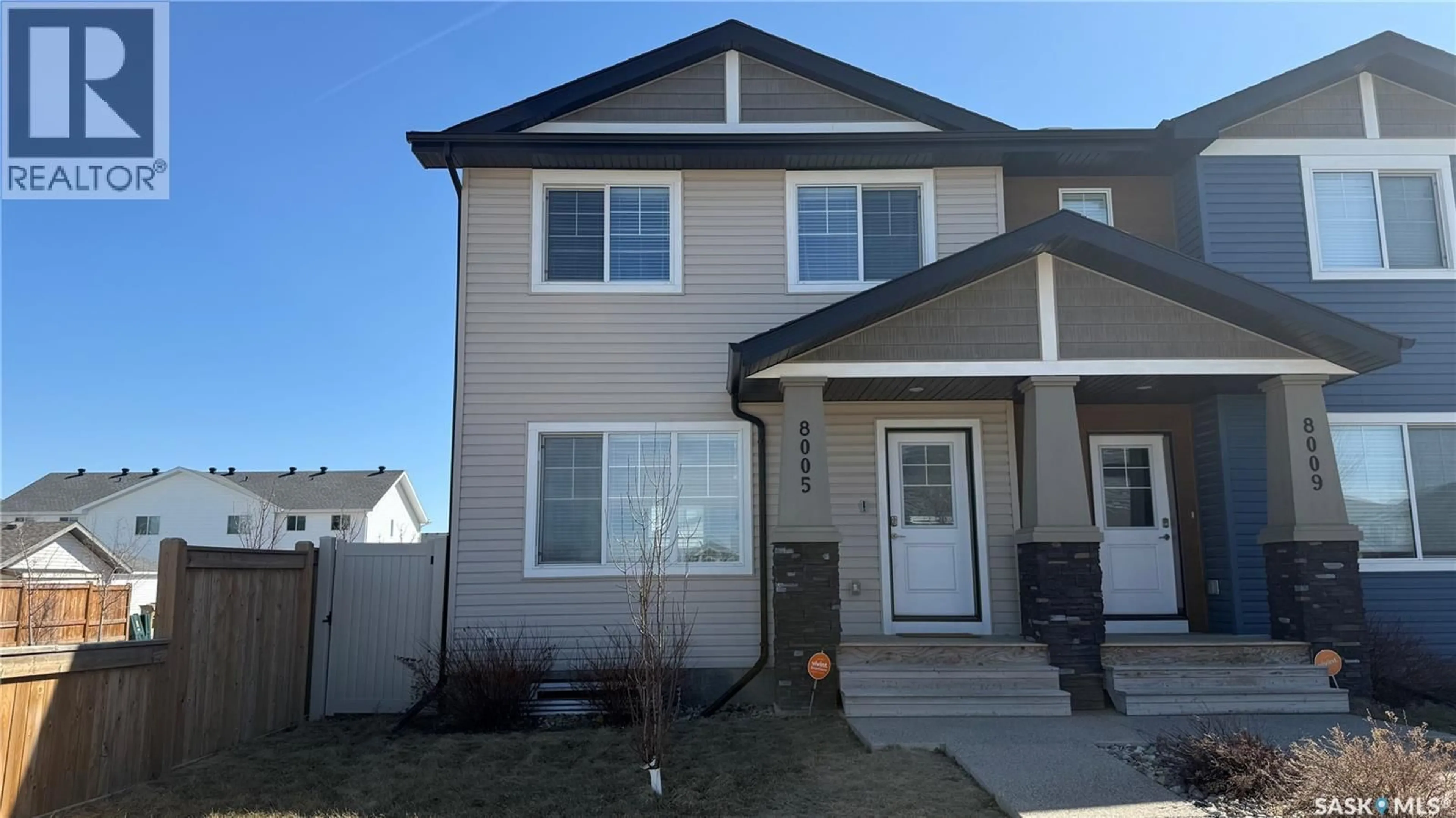 Home with vinyl exterior material, street for 8005 FLAX AVENUE, Regina Saskatchewan S4Y0E7