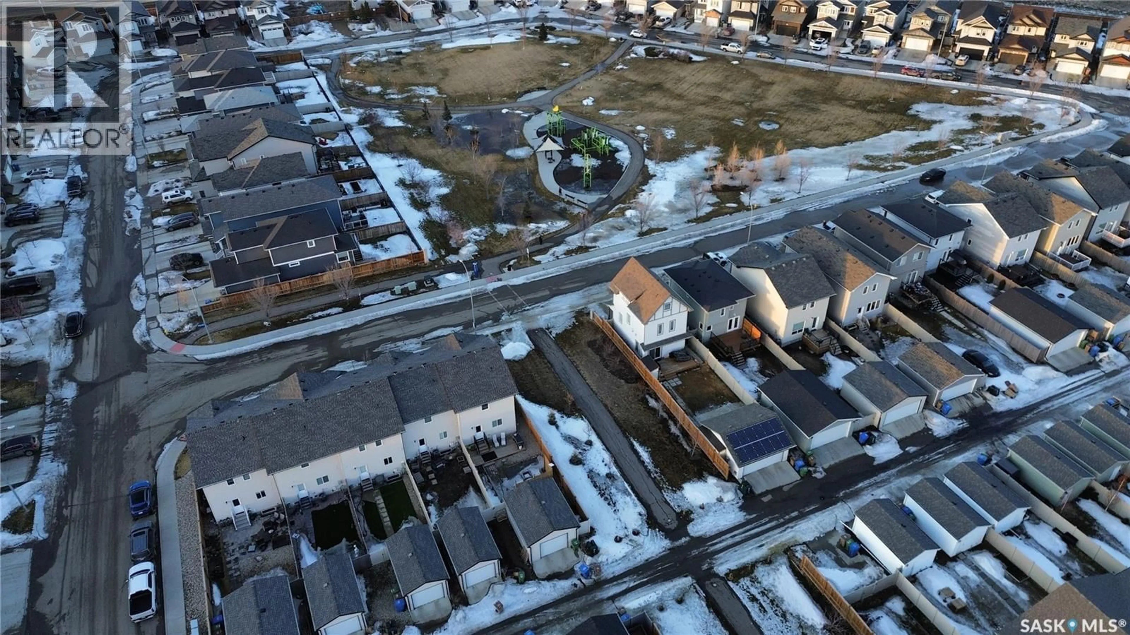 A pic from outside/outdoor area/front of a property/back of a property/a pic from drone, street for 8005 FLAX AVENUE, Regina Saskatchewan S4Y0E7