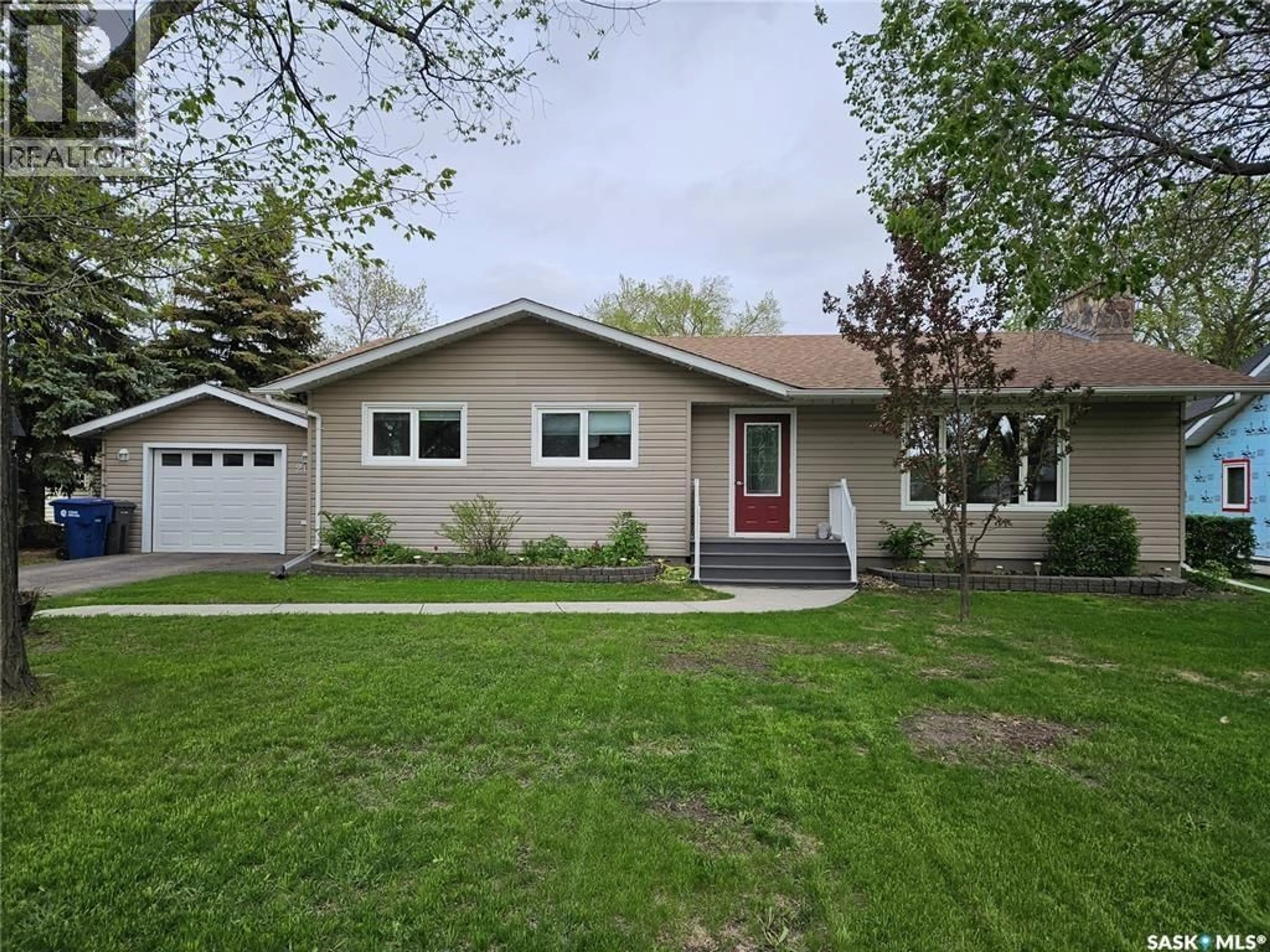 Home with vinyl exterior material, street for 205 1ST E, Carlyle Saskatchewan S0C0R0