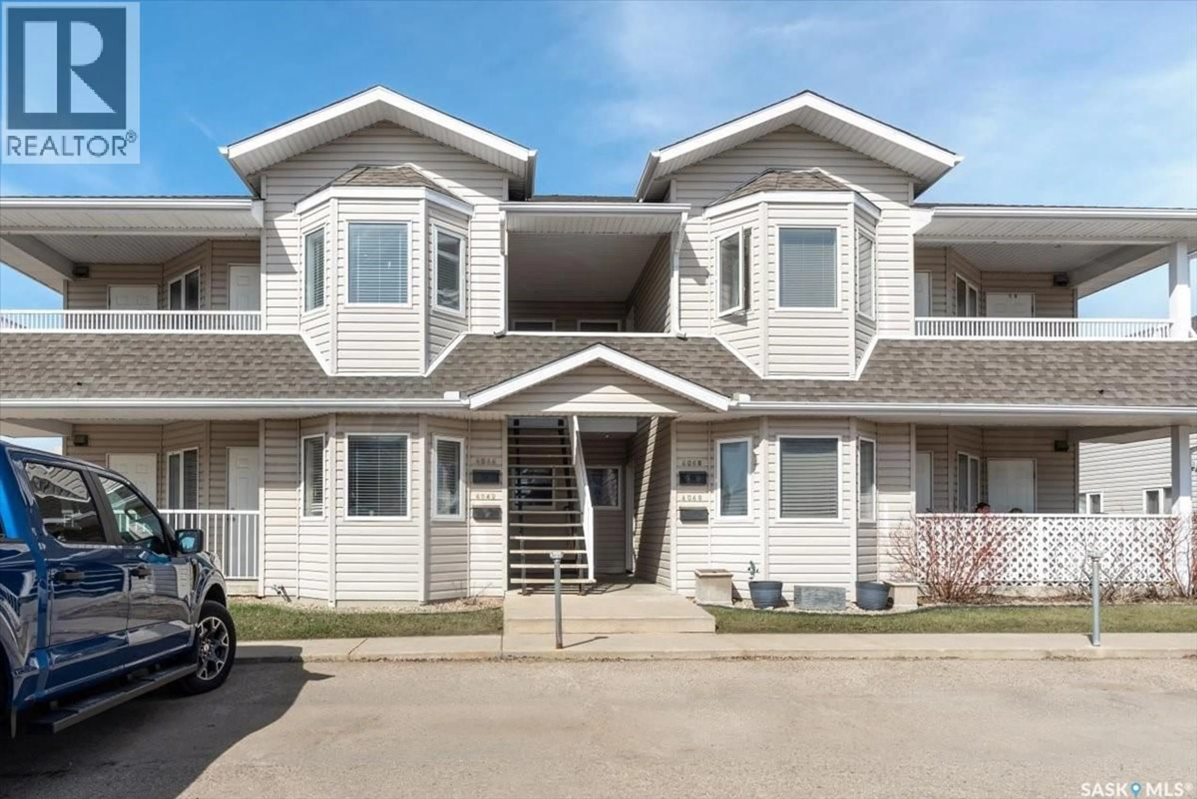 Home with vinyl exterior material, street for E - 4044 BUCKINGHAM DRIVE, Regina Saskatchewan S4V3A9