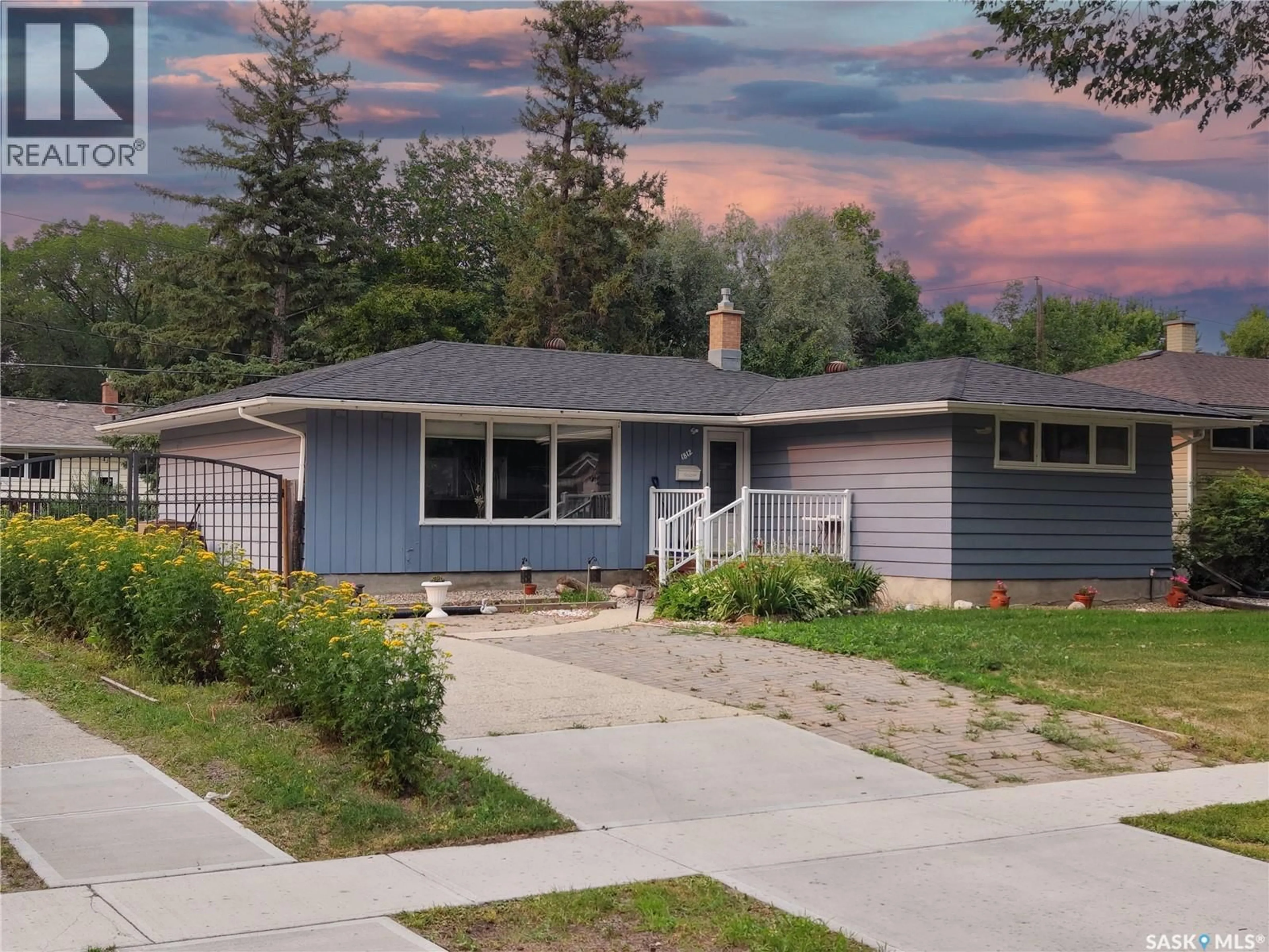 Home with vinyl exterior material, street for 1812 GRANT DRIVE, Regina Saskatchewan S4S4V4