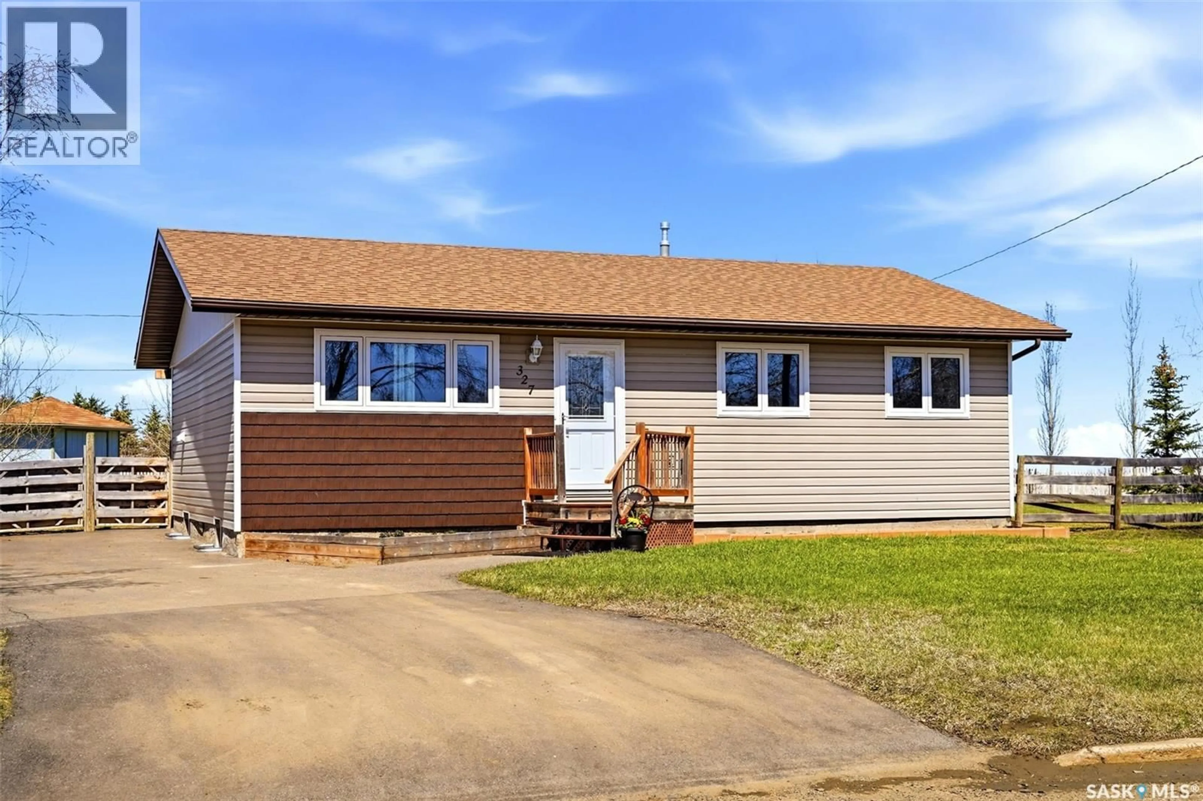 Home with vinyl exterior material, street for 327 COTEAU STREET, Milestone Saskatchewan S0G3L0