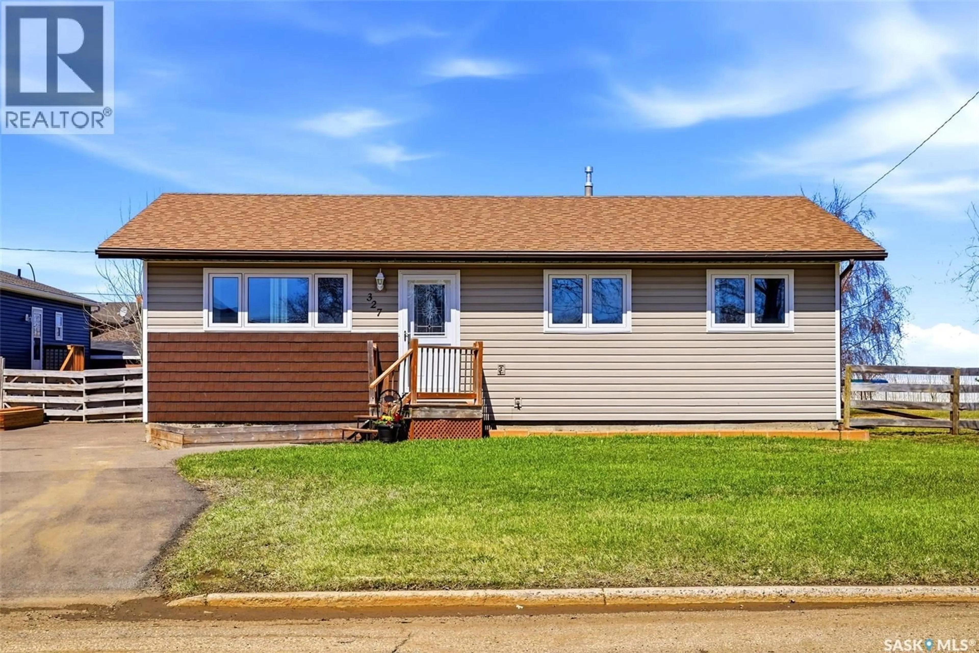 Home with vinyl exterior material, street for 327 COTEAU STREET, Milestone Saskatchewan S0G3L0