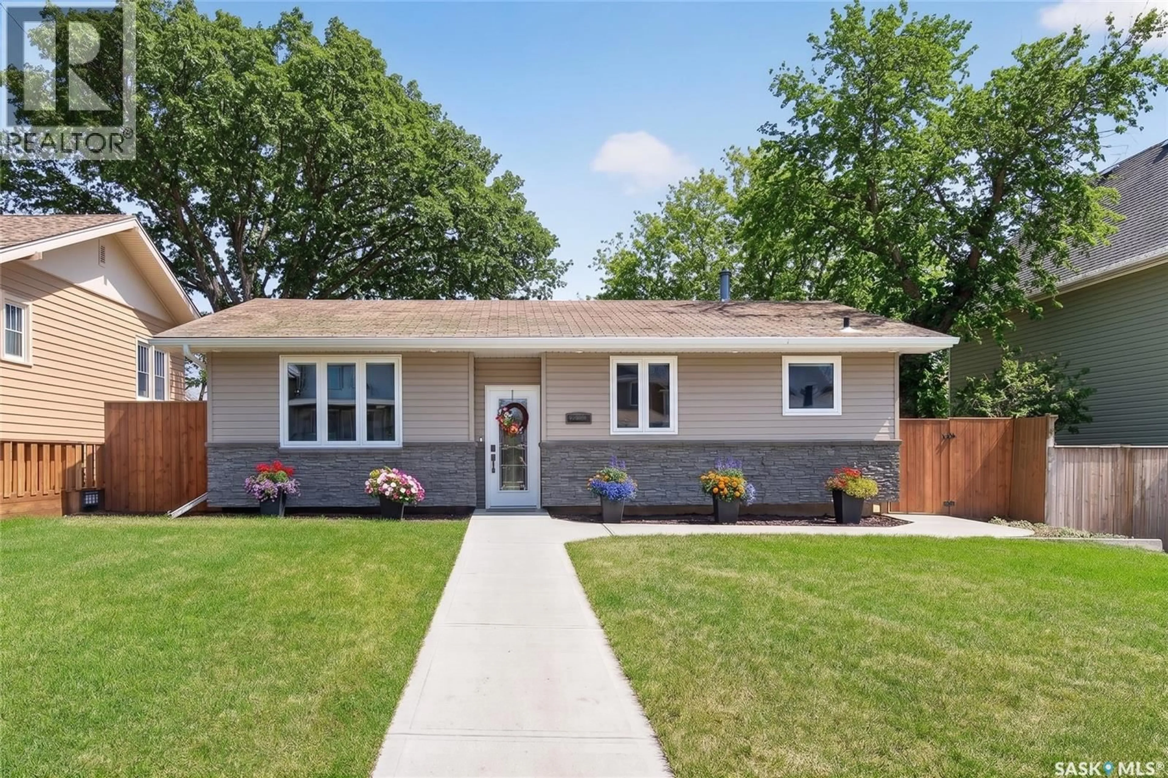 Home with brick exterior material, street for 1109 1ST AVENUE, Moose Jaw Saskatchewan S6H1A2