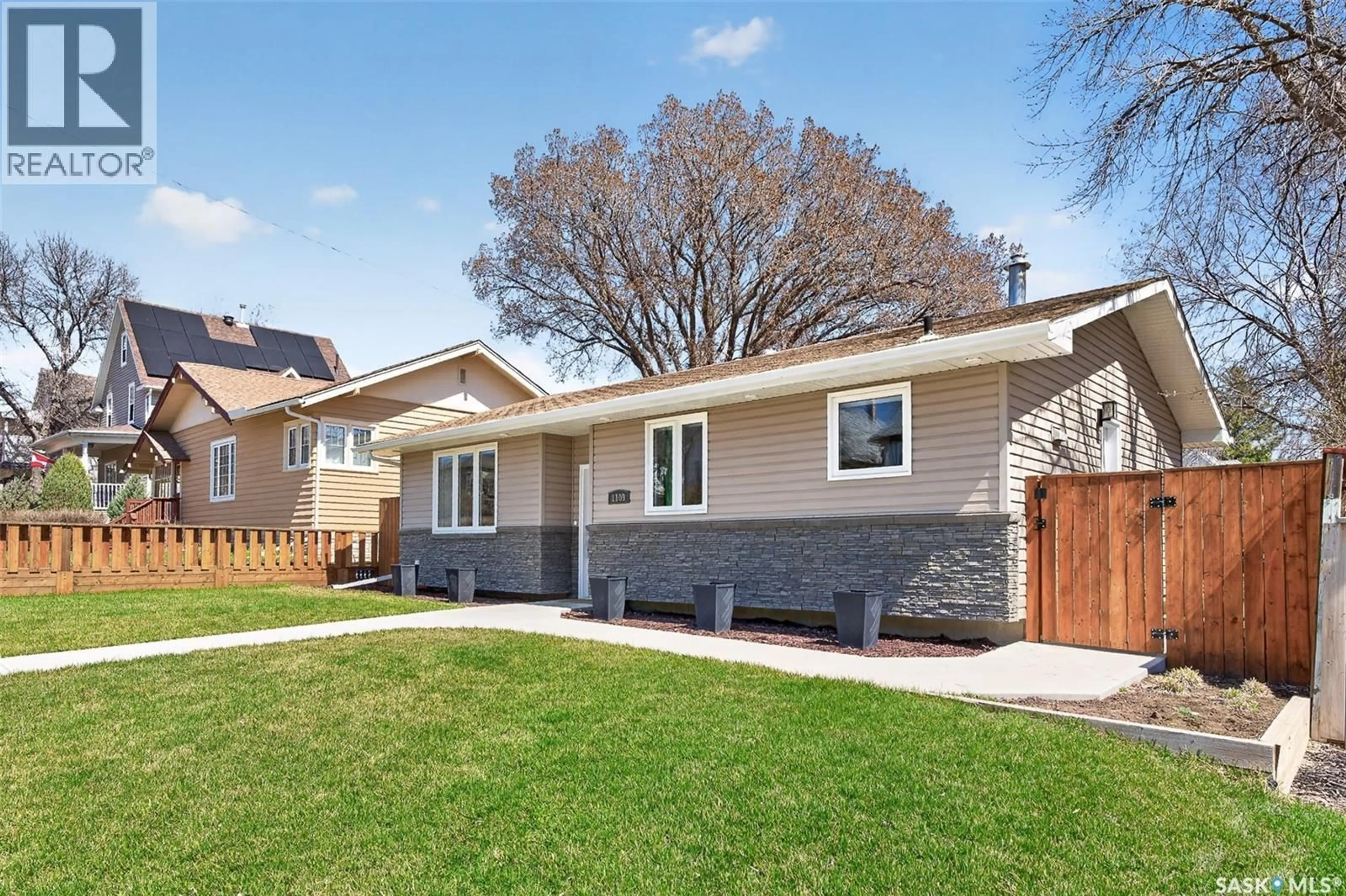Home with brick exterior material, street for 1109 1ST AVENUE, Moose Jaw Saskatchewan S6H1A2