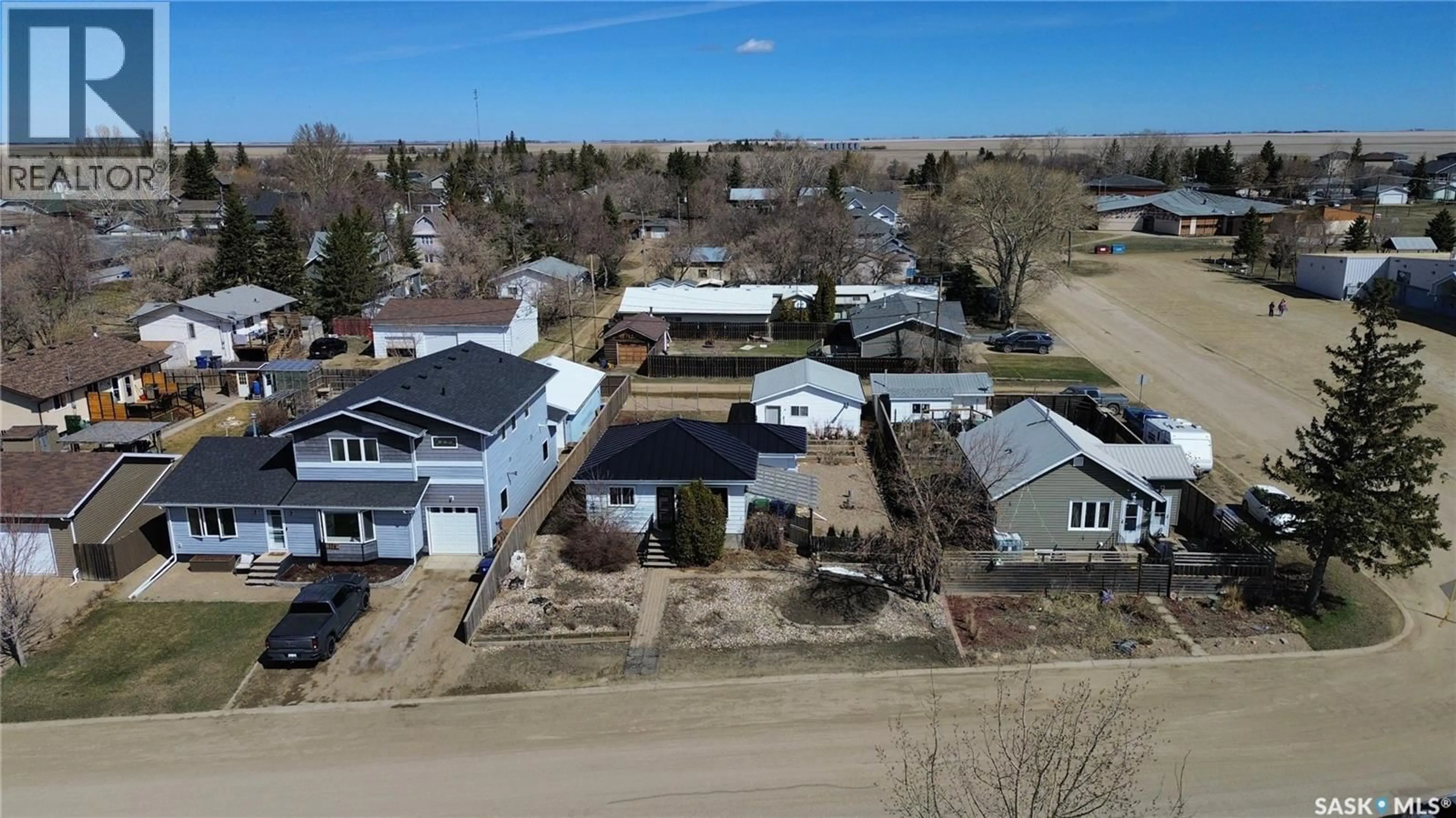 A pic from outside/outdoor area/front of a property/back of a property/a pic from drone, street for 108 FRONT STREET, Pense Saskatchewan S0G3W0