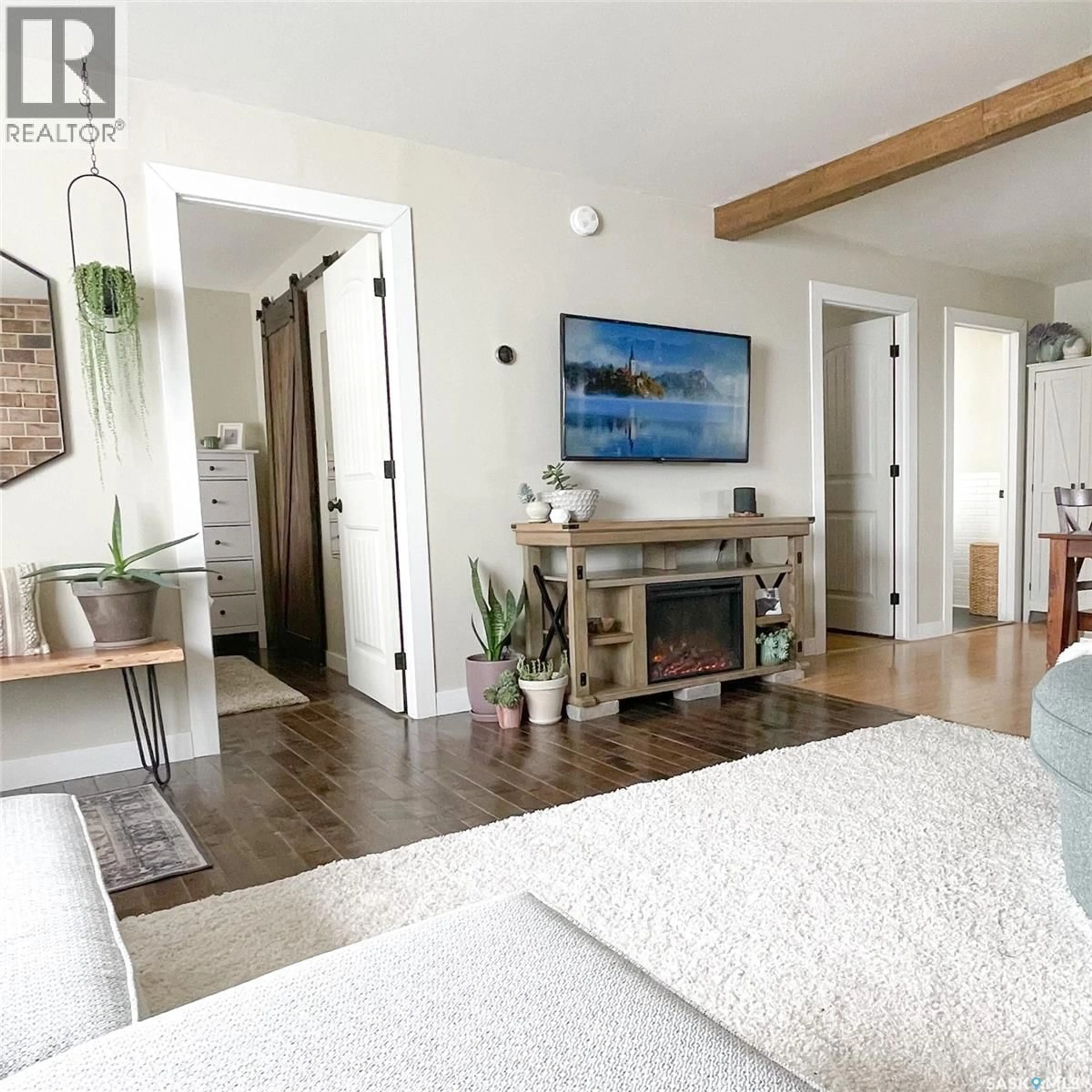 Living room with furniture, unknown for 108 FRONT STREET, Pense Saskatchewan S0G3W0