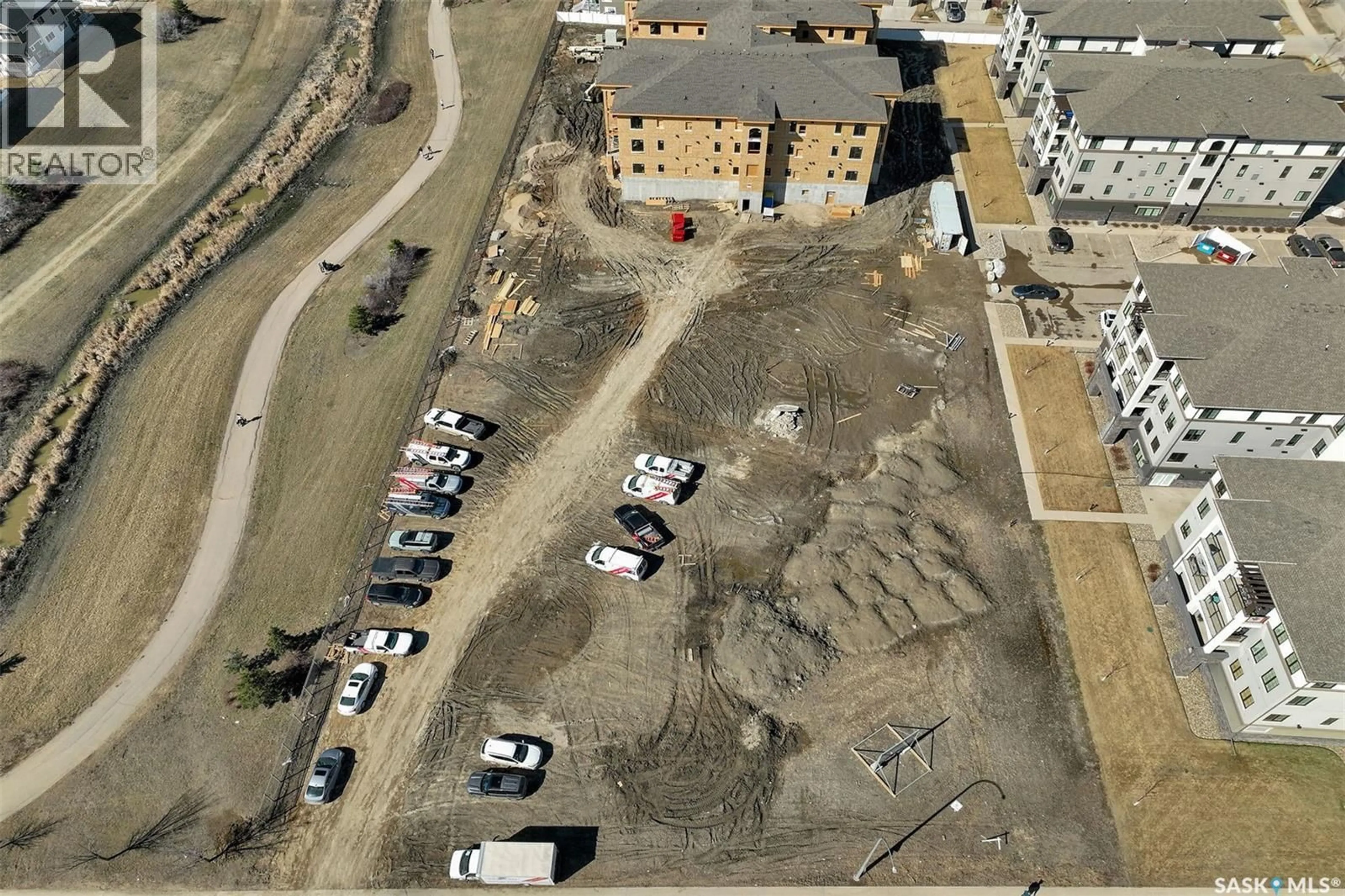 A pic from outside/outdoor area/front of a property/back of a property/a pic from drone, building for 208 - 4594 HARBOUR LANDING DRIVE, Regina Saskatchewan S4W0R8