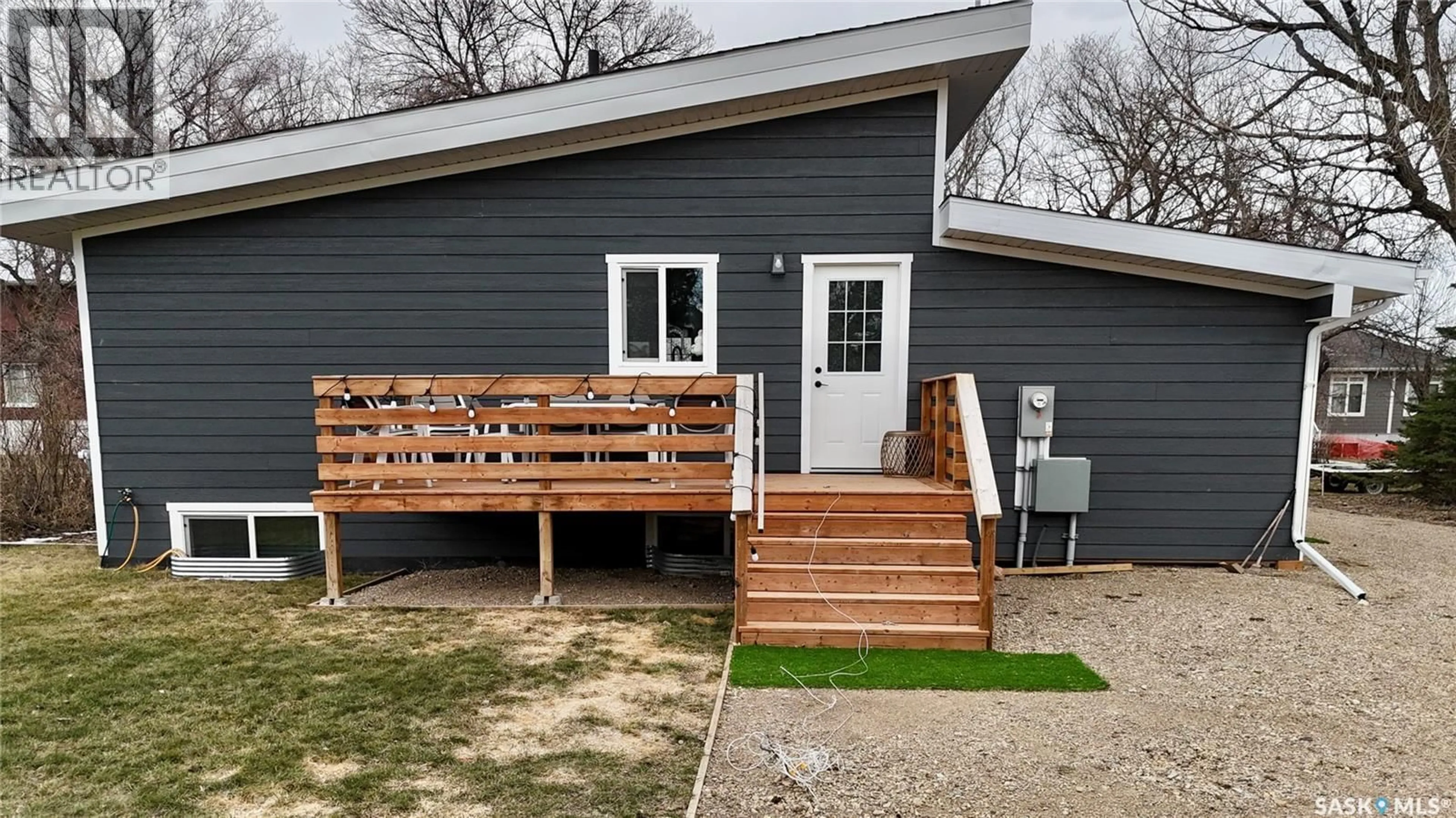 Home with vinyl exterior material, street for 210 COULTHARD STREET, Conquest Saskatchewan S0L0L0