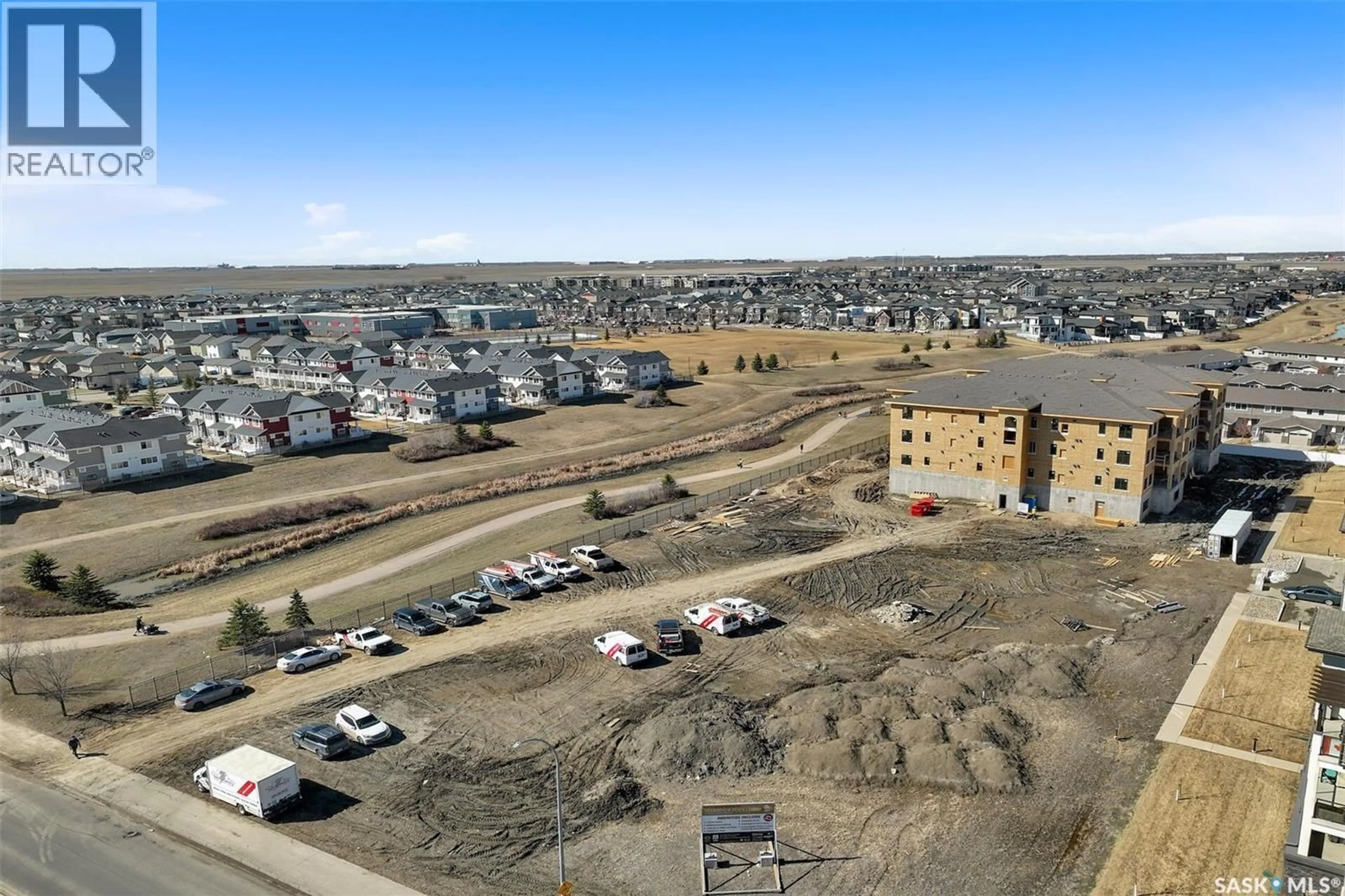 A pic from outside/outdoor area/front of a property/back of a property/a pic from drone, unknown for 306 - 4594 HARBOUR LANDING DRIVE, Regina Saskatchewan S4W0R8