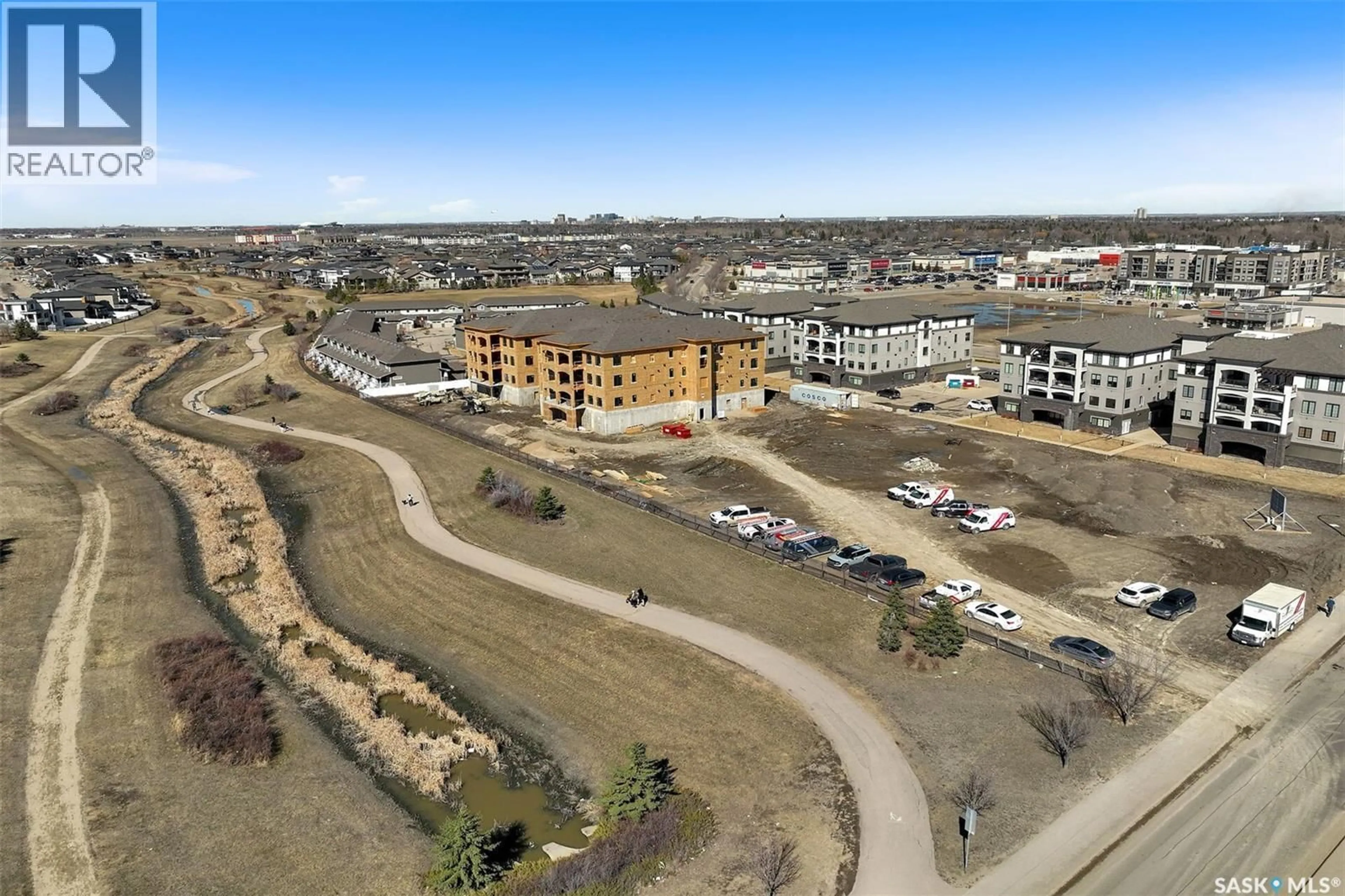 A pic from outside/outdoor area/front of a property/back of a property/a pic from drone, building for 306 - 4594 HARBOUR LANDING DRIVE, Regina Saskatchewan S4W0R8