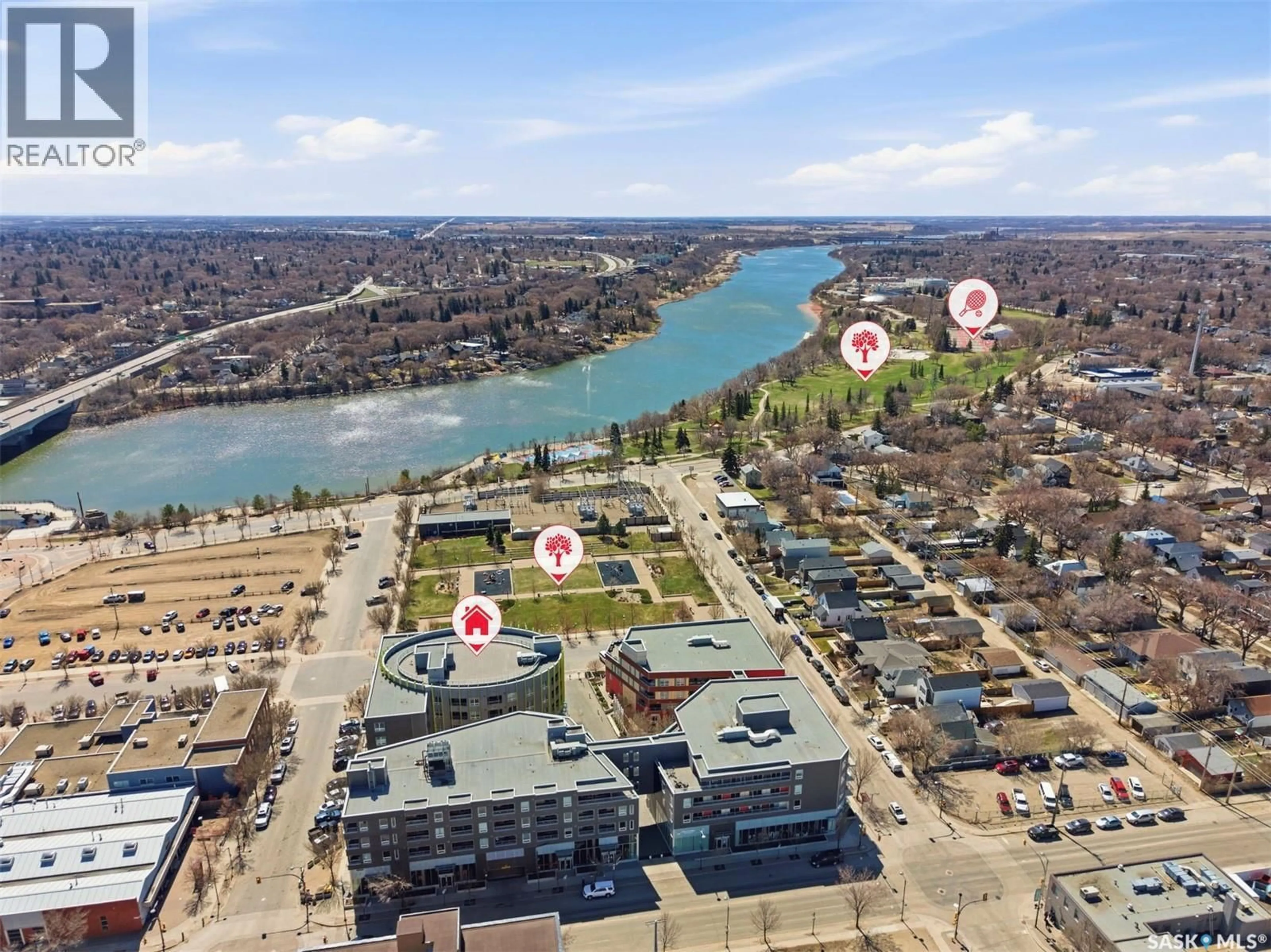 A pic from outside/outdoor area/front of a property/back of a property/a pic from drone, water/lake/river/ocean view for S - 204 409 B AVENUE, Saskatoon Saskatchewan S7M5M8