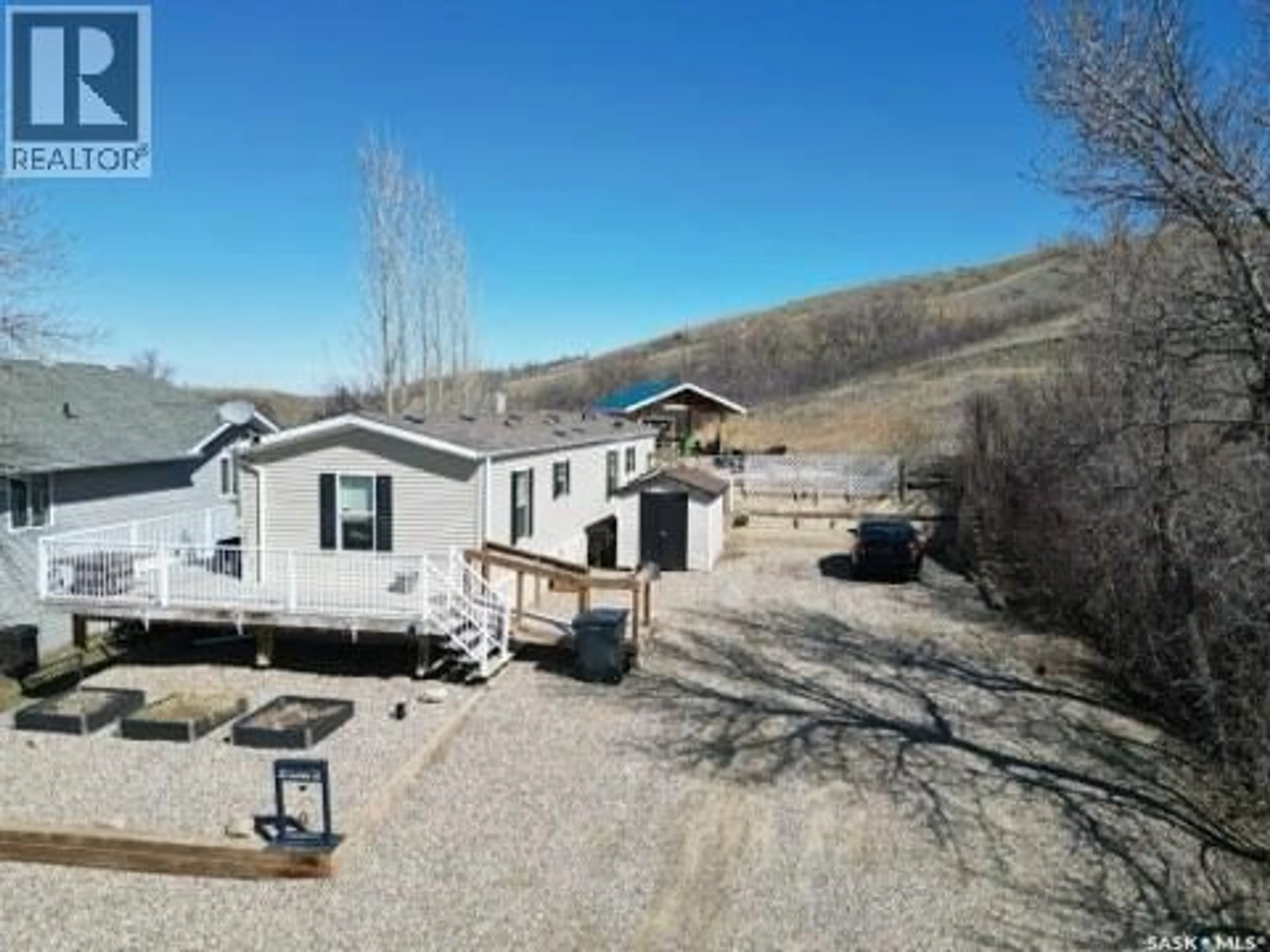 A pic from outside/outdoor area/front of a property/back of a property/a pic from drone, mountain view for 53 JACKSON STREET, Katepwa Beach Saskatchewan S0G2Y0