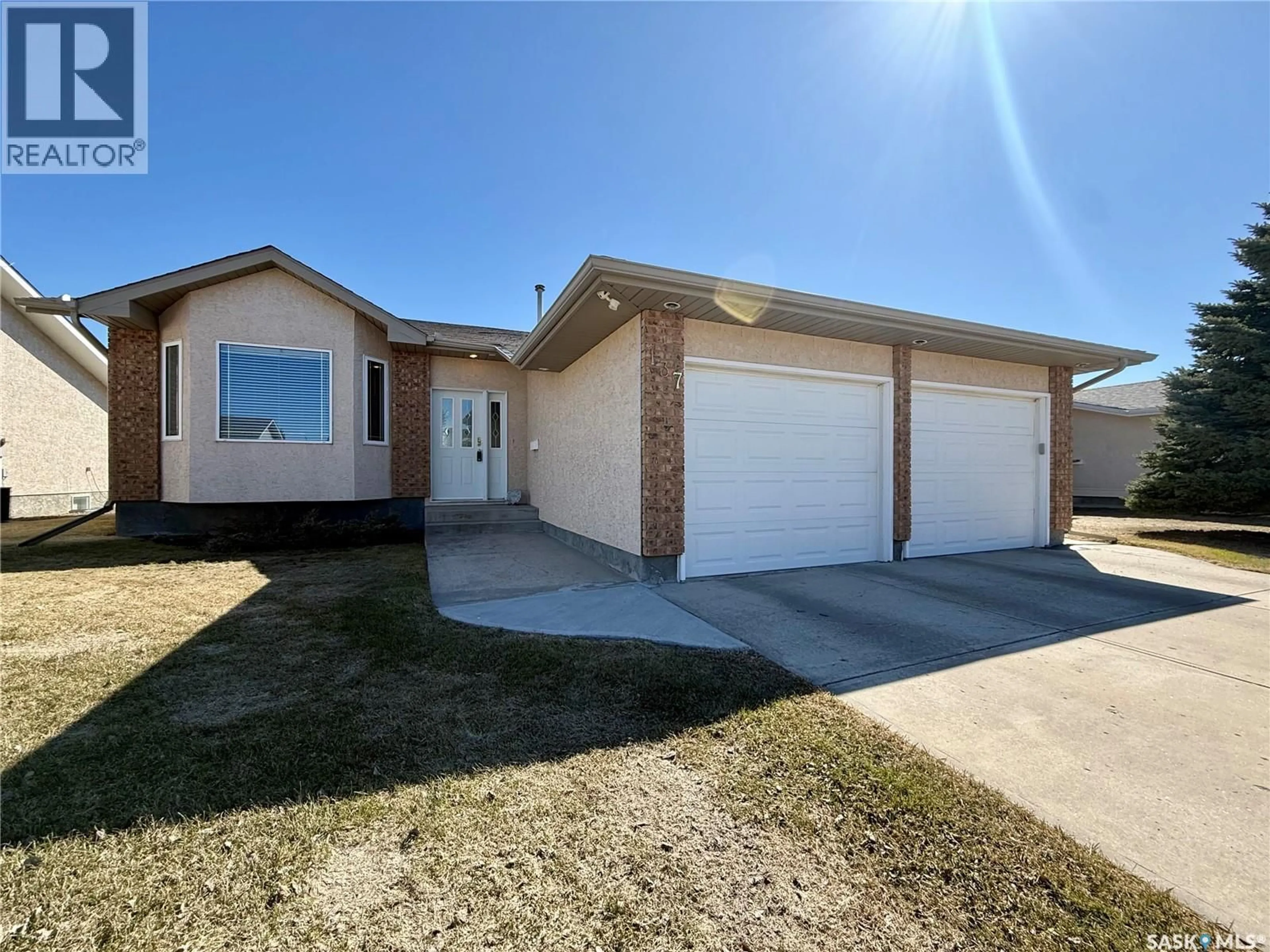 Home with brick exterior material, street for 137 CALDWELL DRIVE, Yorkton Saskatchewan S3N4A5