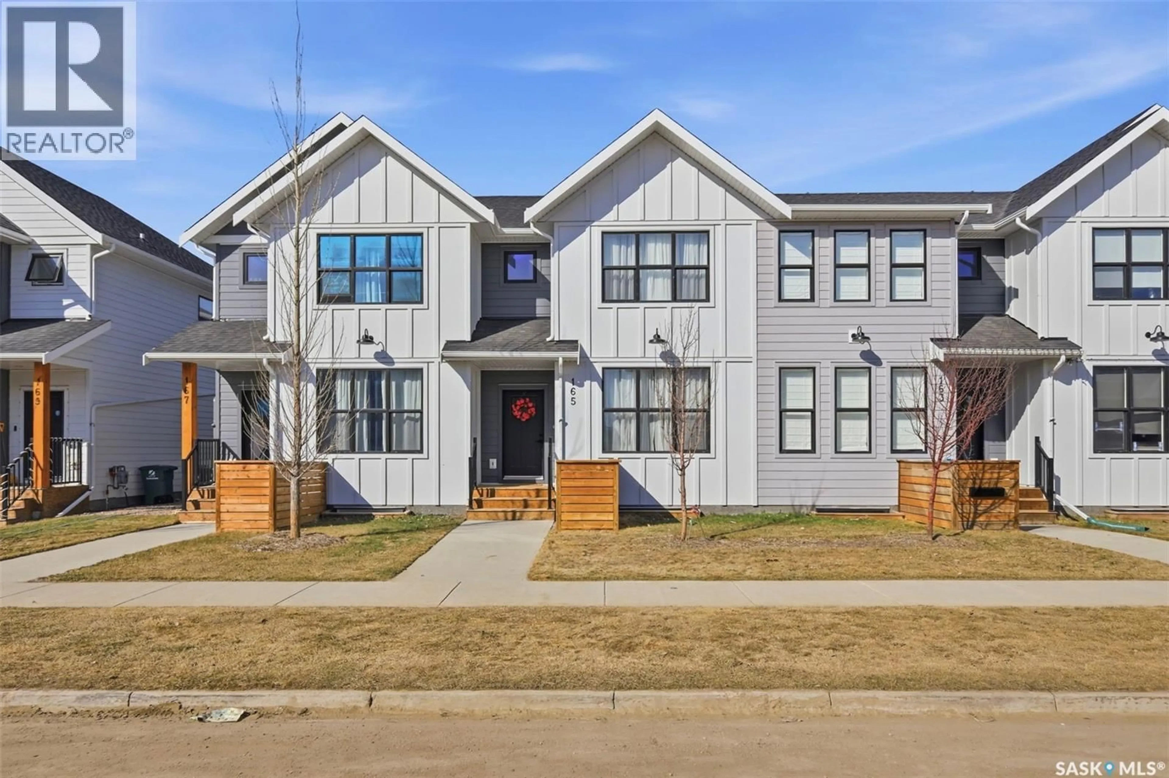 Home with brick exterior material, street for 165 ROSEWOOD BOULEVARD, Saskatoon Saskatchewan S7V0X2