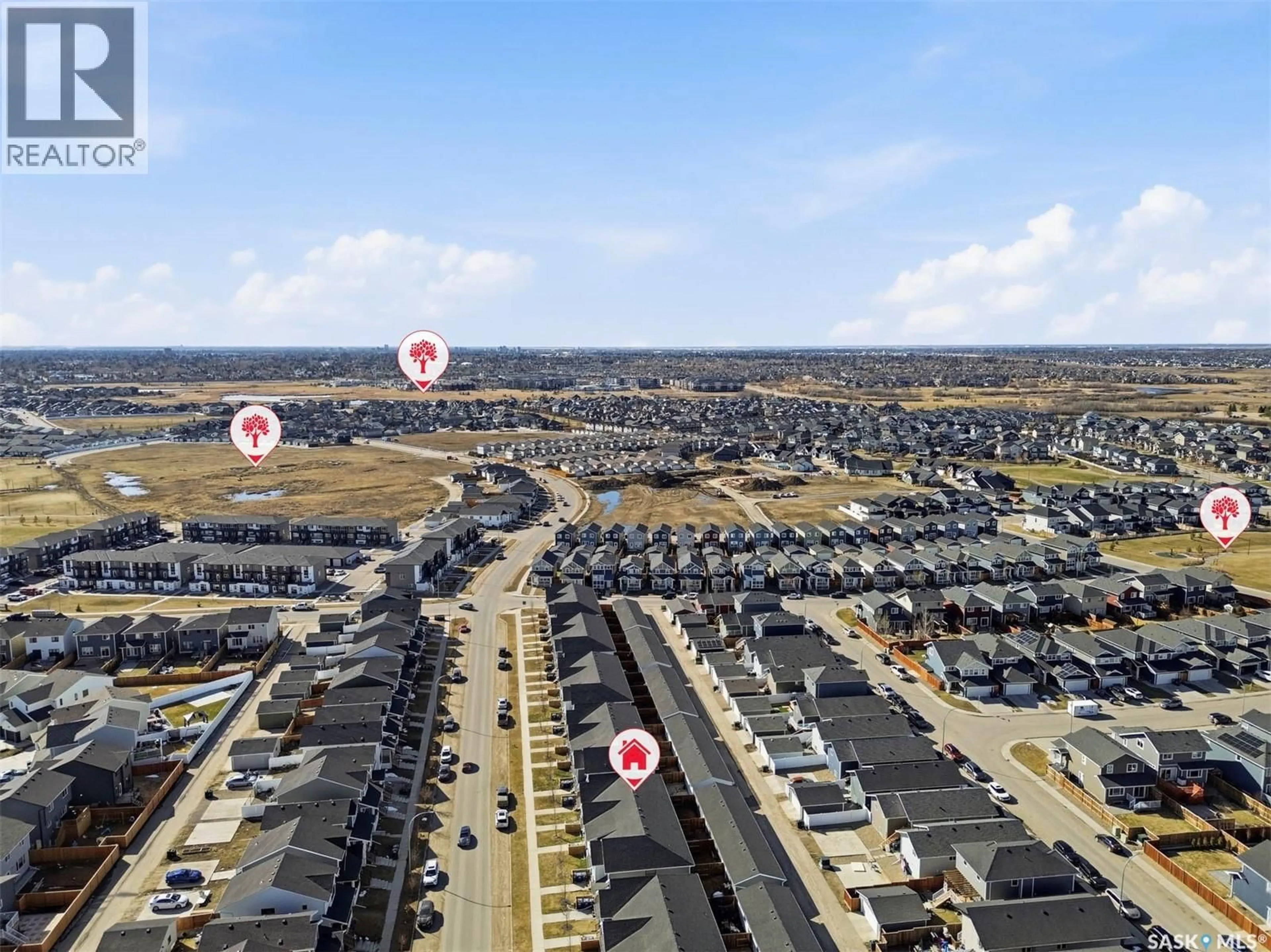 A pic from outside/outdoor area/front of a property/back of a property/a pic from drone, street for 165 ROSEWOOD BOULEVARD, Saskatoon Saskatchewan S7V0X2