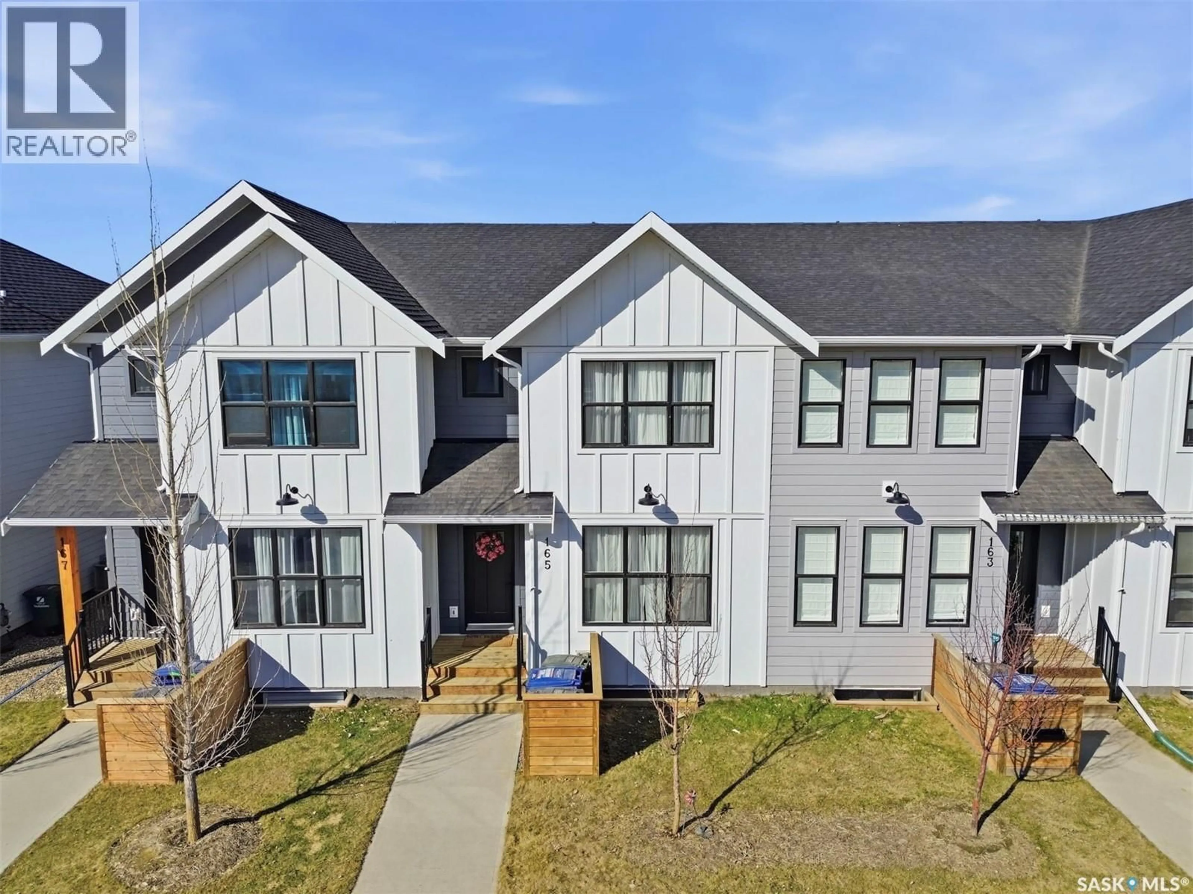 A pic from outside/outdoor area/front of a property/back of a property/a pic from drone, building for 165 ROSEWOOD BOULEVARD, Saskatoon Saskatchewan S7V0X2