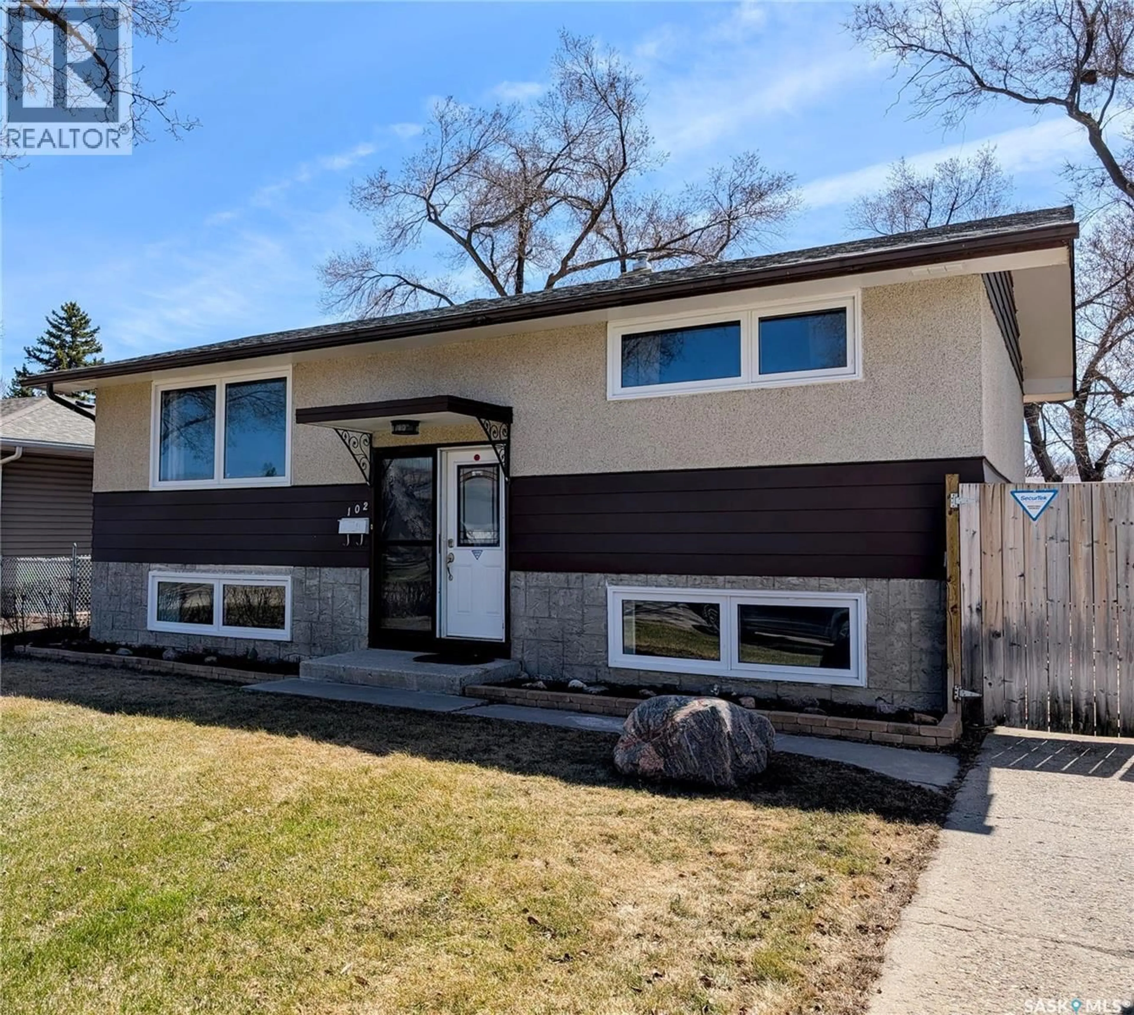 Home with vinyl exterior material, street for 102 MOLLARD CRESCENT, Regina Saskatchewan S4T6J5