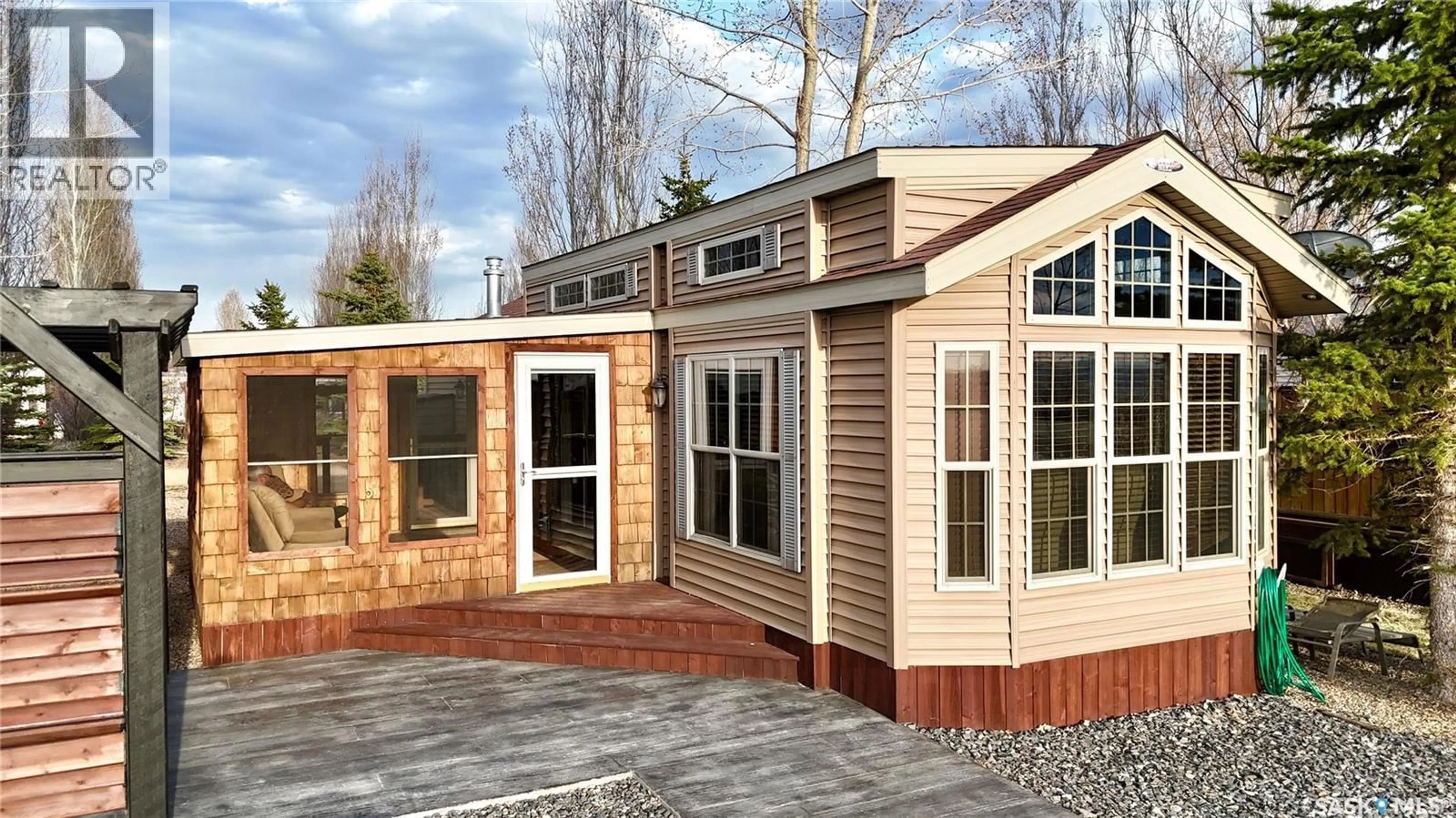 Home with vinyl exterior material, building for 13 HITCHCOCK HIDEAWAY, Coteau Rm No. 255 Saskatchewan S0L0G0