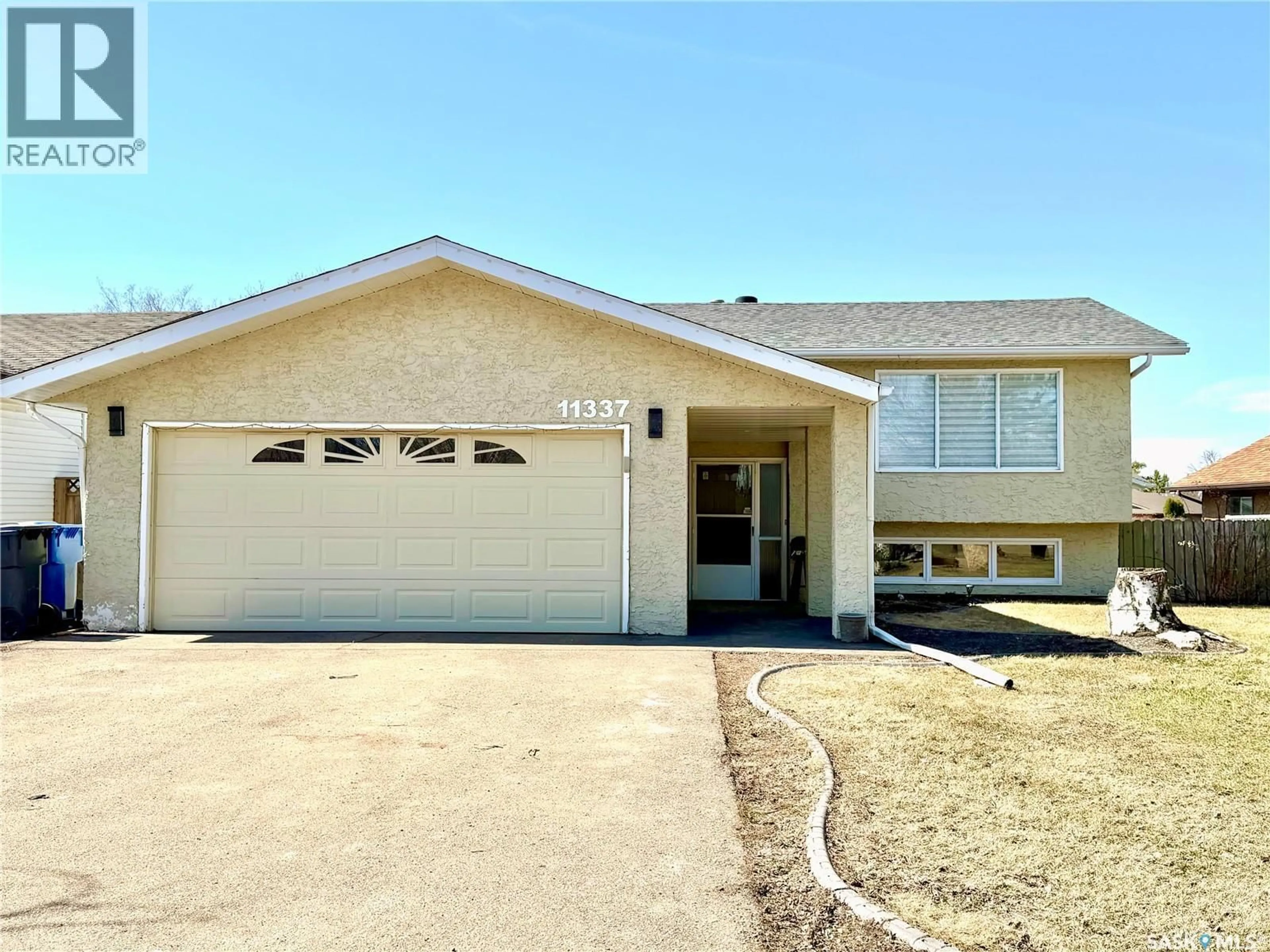 Home with vinyl exterior material, street for 11337 CLARK DRIVE, North Battleford Saskatchewan S9A3P5