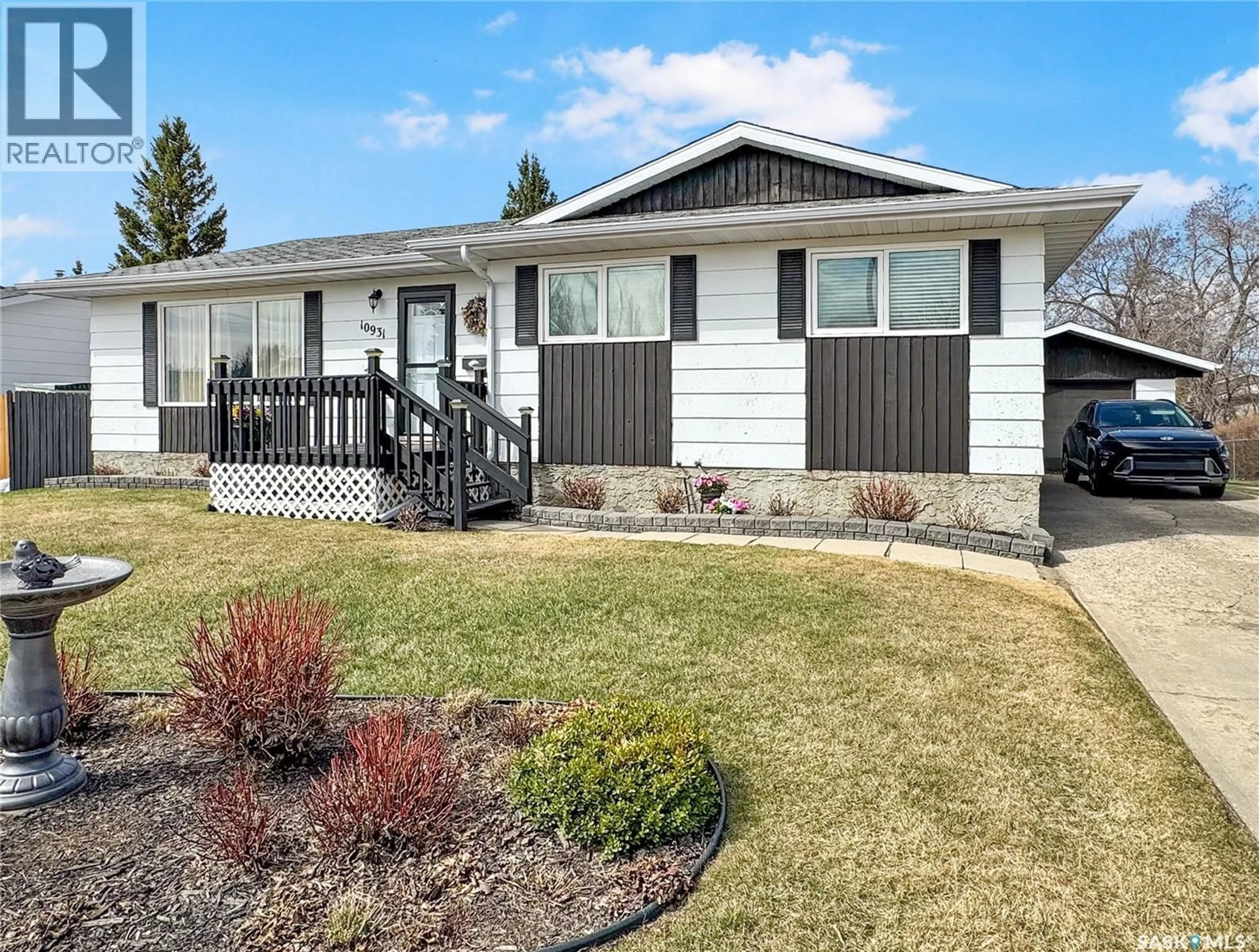 Home with vinyl exterior material, street for 10931 SCOTT DRIVE, North Battleford Saskatchewan S9A3N2