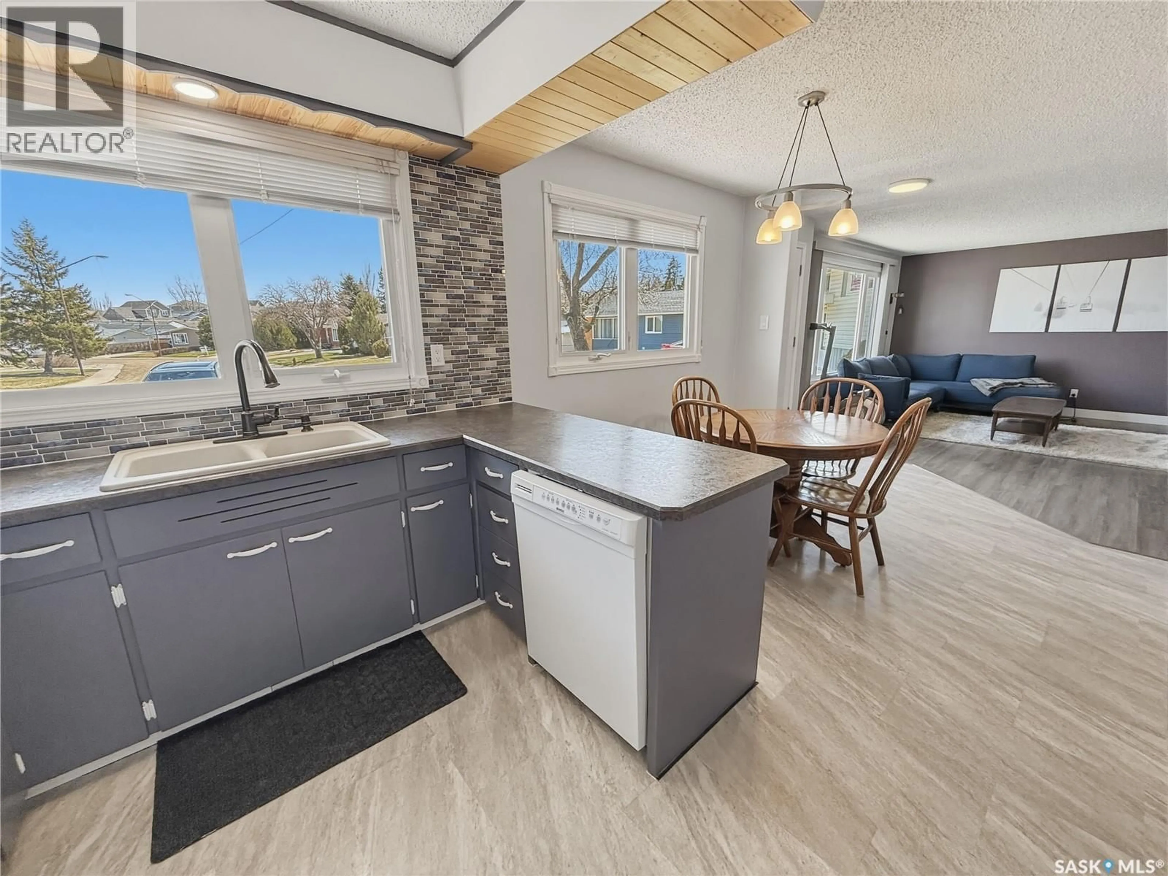 Open concept kitchen, unknown for 300 ASH PLACE, Swift Current Saskatchewan S9H3E4