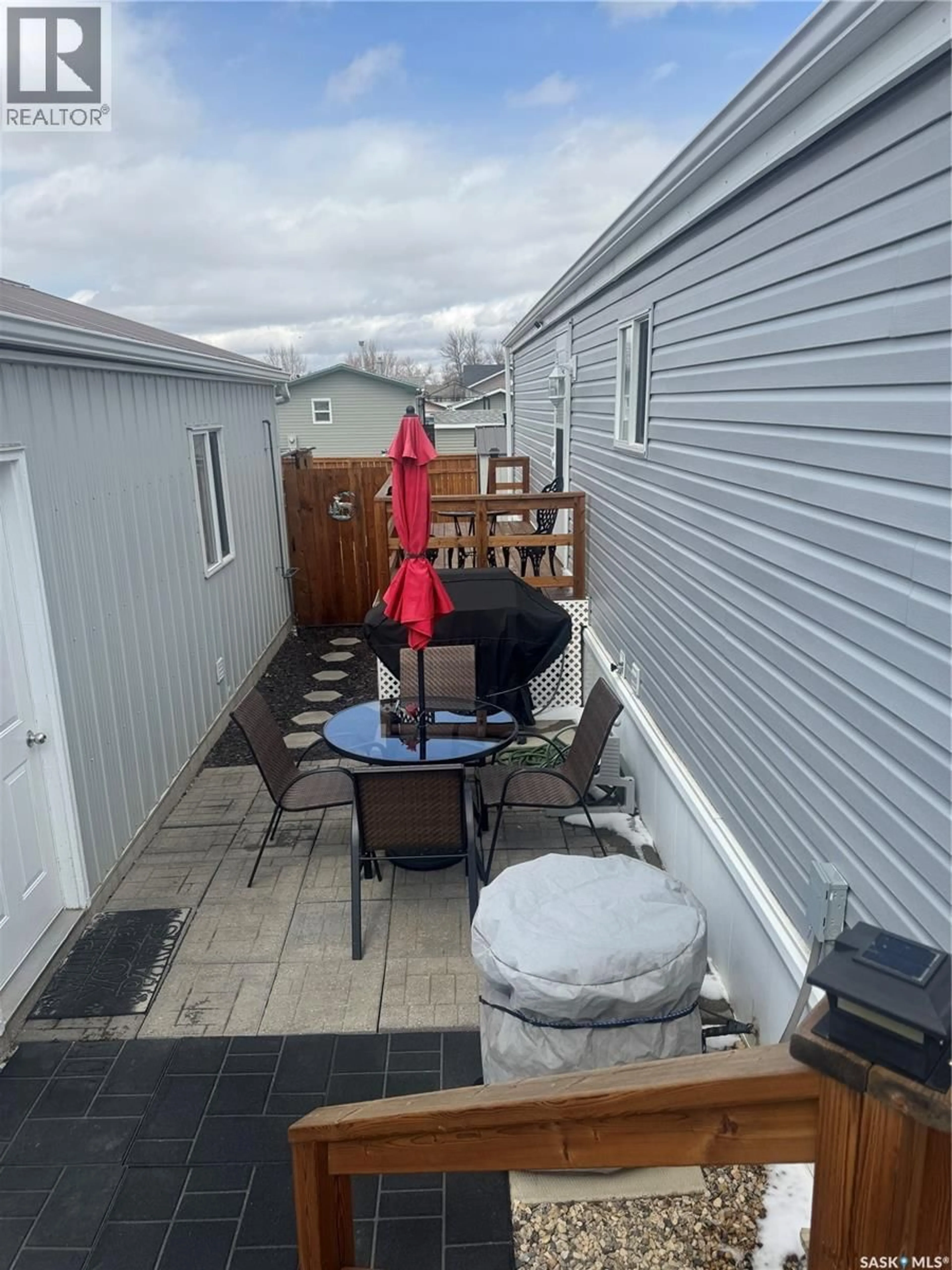 Patio, street for 357 10TH AVENUE, Weyburn Saskatchewan S4H3L8