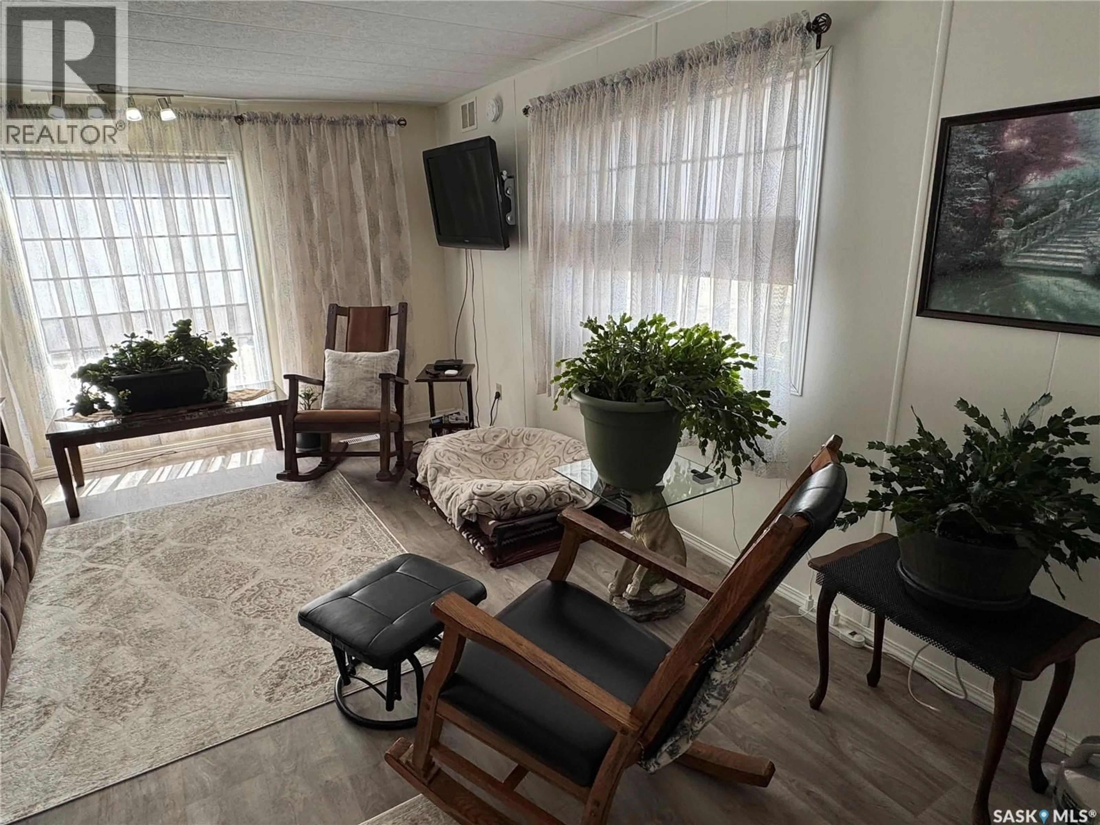Living room with furniture, unknown for 357 10TH AVENUE, Weyburn Saskatchewan S4H3L8