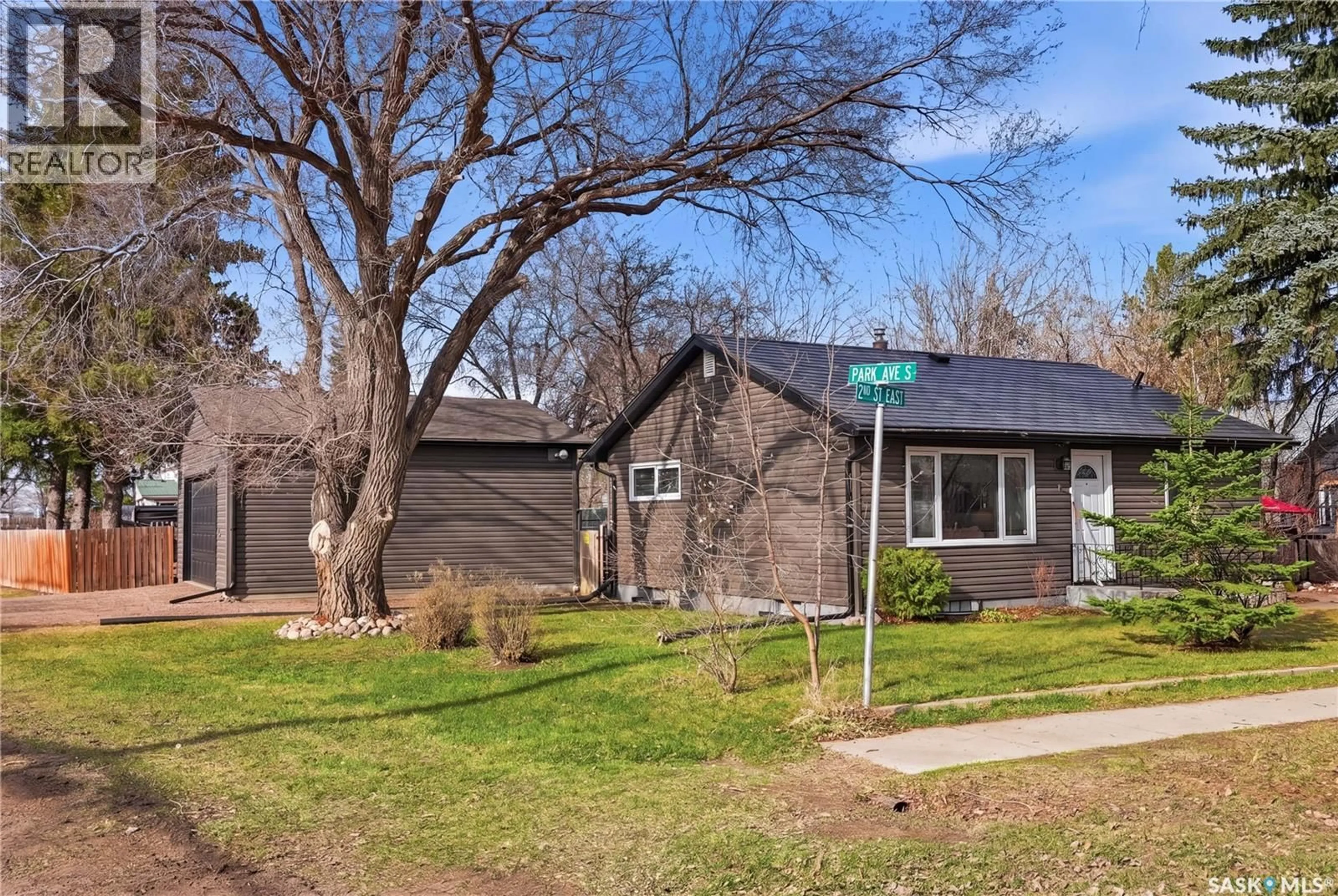 Home with vinyl exterior material, street for 1 2ND STREET, Langham Saskatchewan S0K2L0