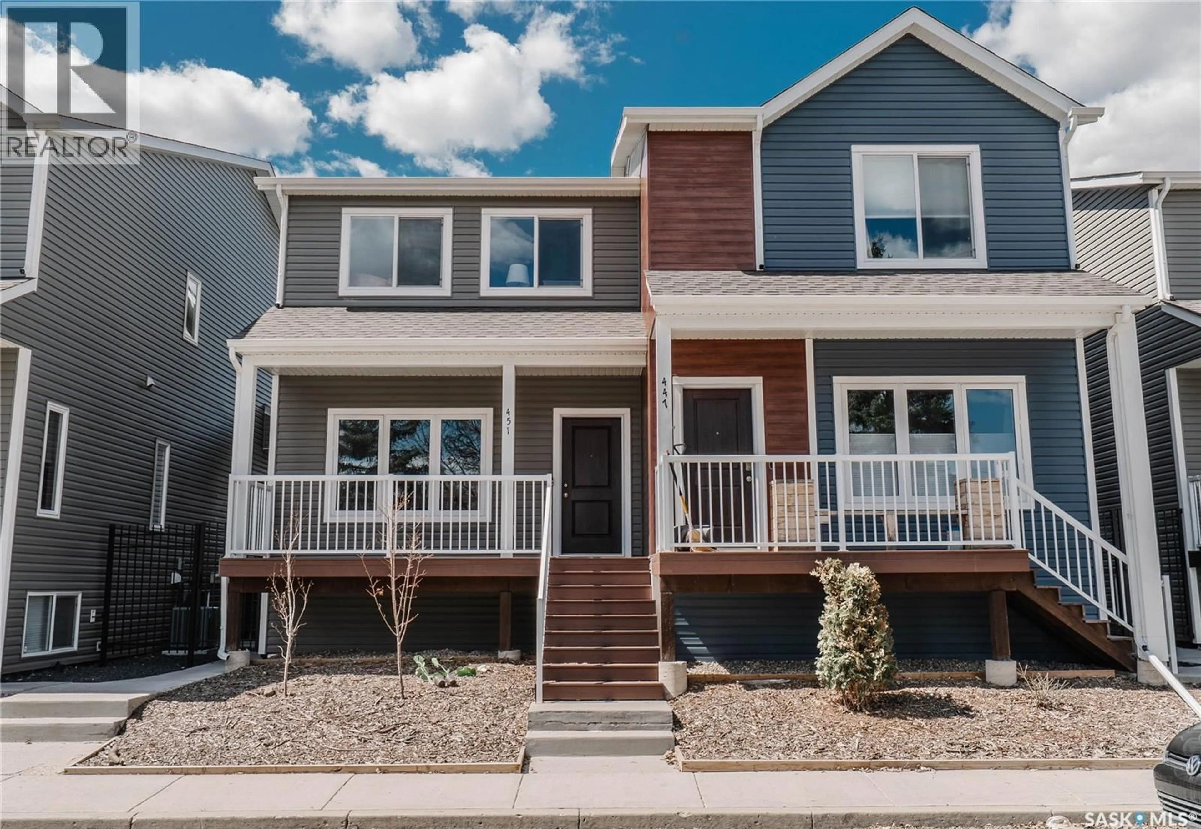 Home with vinyl exterior material, street for 451 L AVENUE, Saskatoon Saskatchewan S7M5Y6