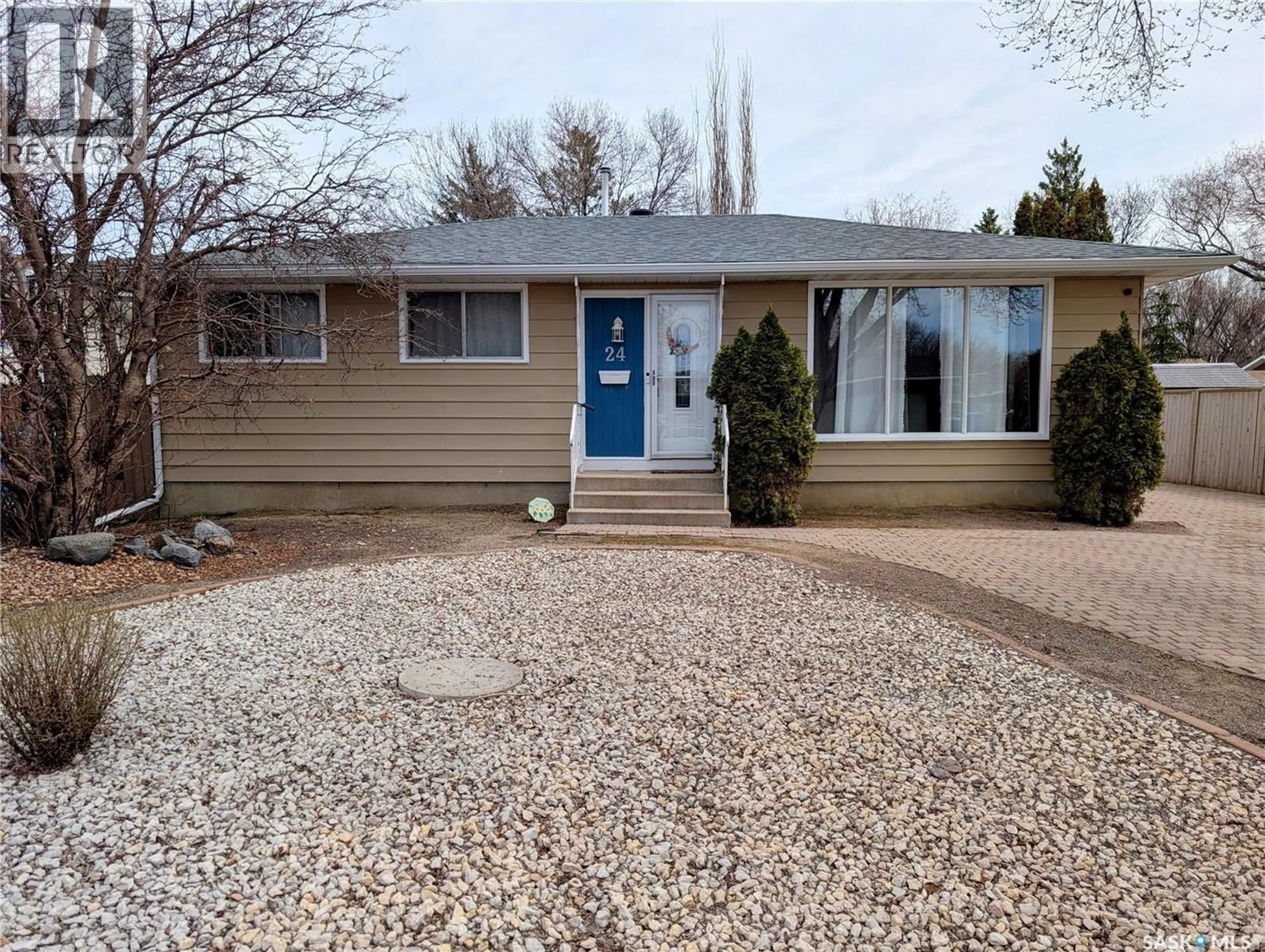 Home with vinyl exterior material, street for 24 DRYBURGH CRESCENT, Regina Saskatchewan S4R6R5