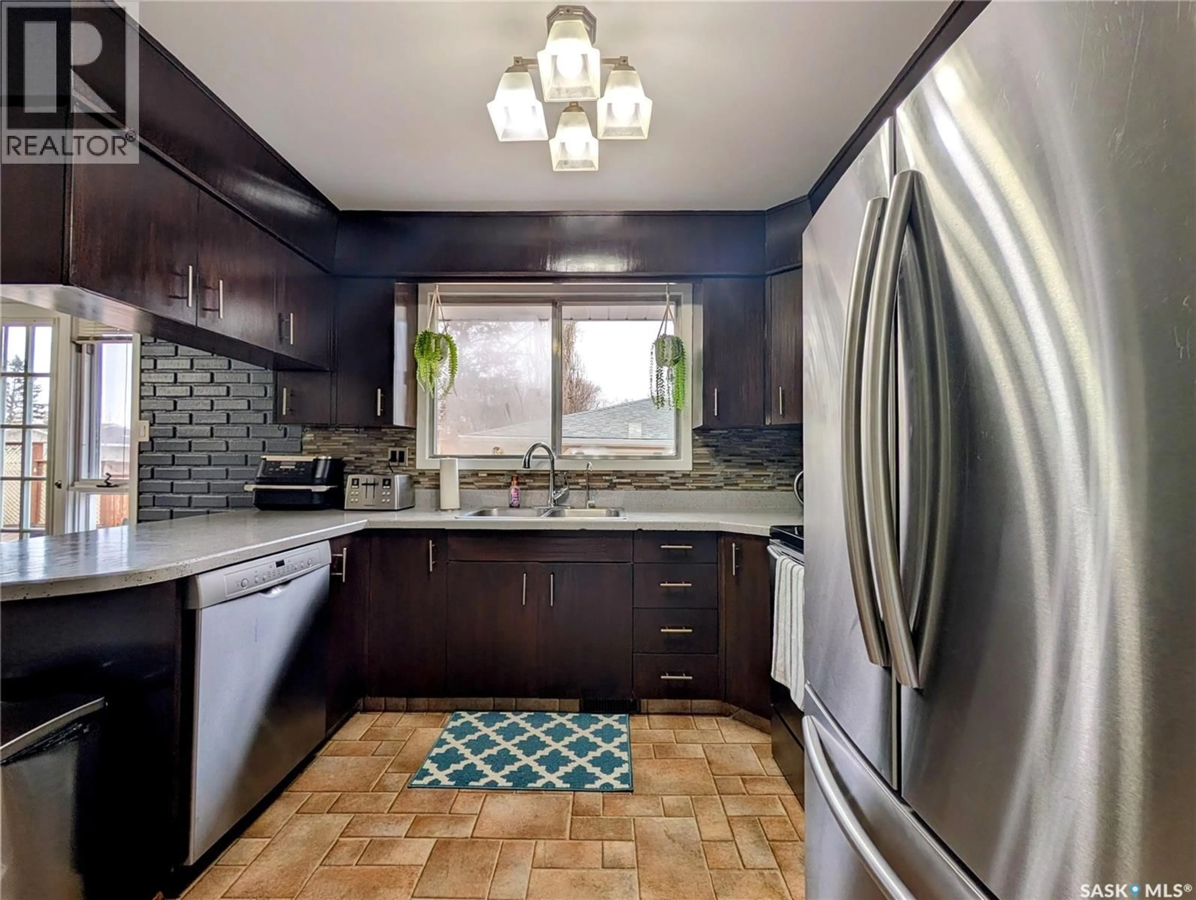 Contemporary kitchen, ceramic/tile floor for 24 DRYBURGH CRESCENT, Regina Saskatchewan S4R6R5