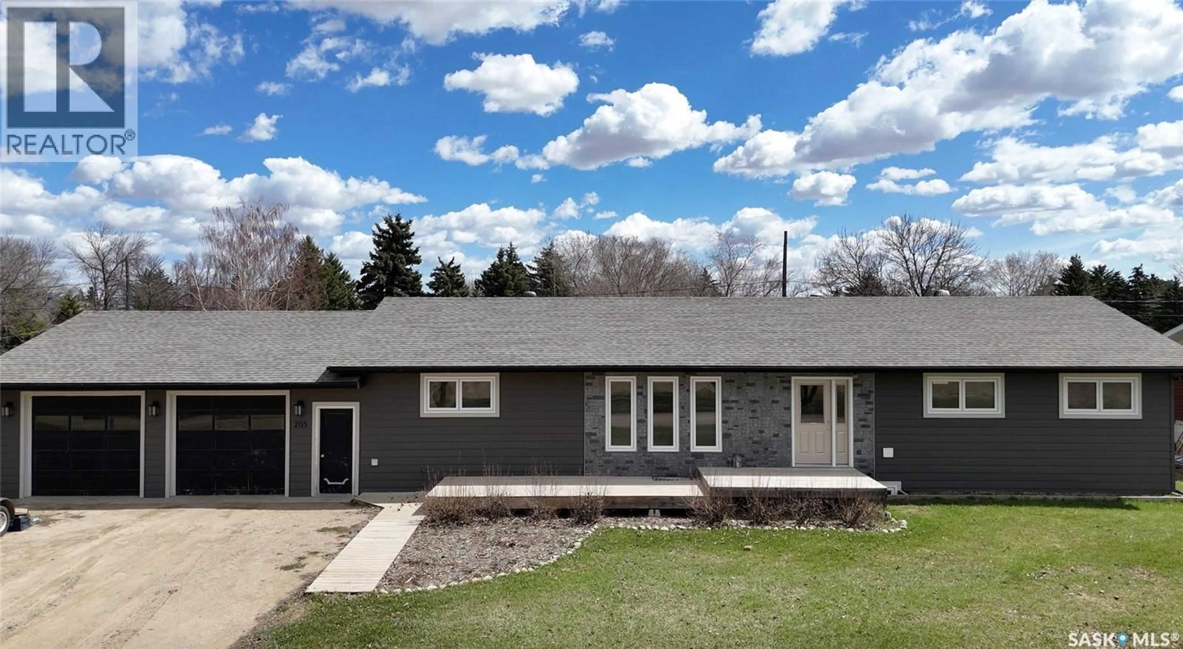 Home with vinyl exterior material, street for 205 CONQUEST STREET, Conquest Saskatchewan S0L0L0
