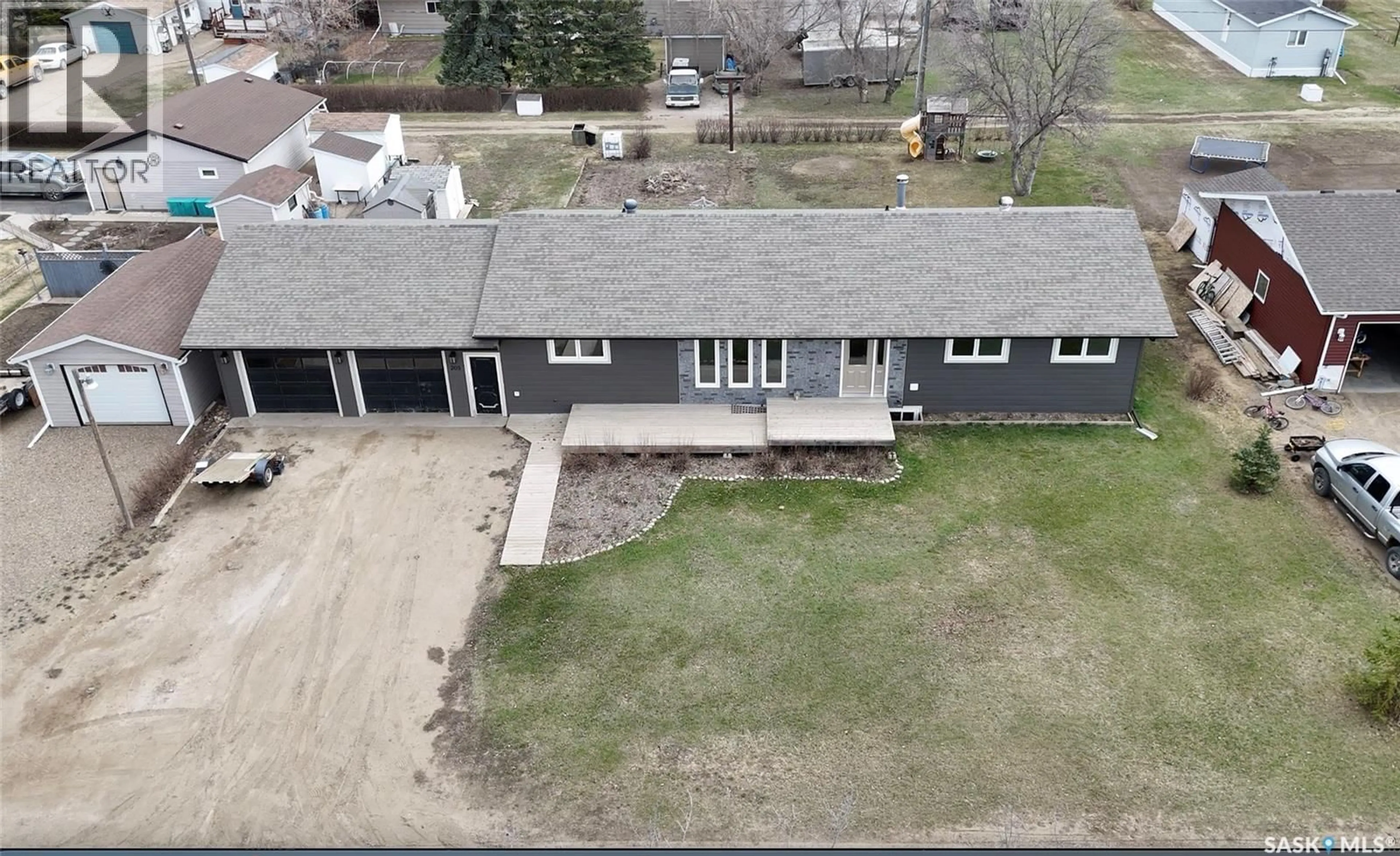 A pic from outside/outdoor area/front of a property/back of a property/a pic from drone, building for 205 CONQUEST STREET, Conquest Saskatchewan S0L0L0