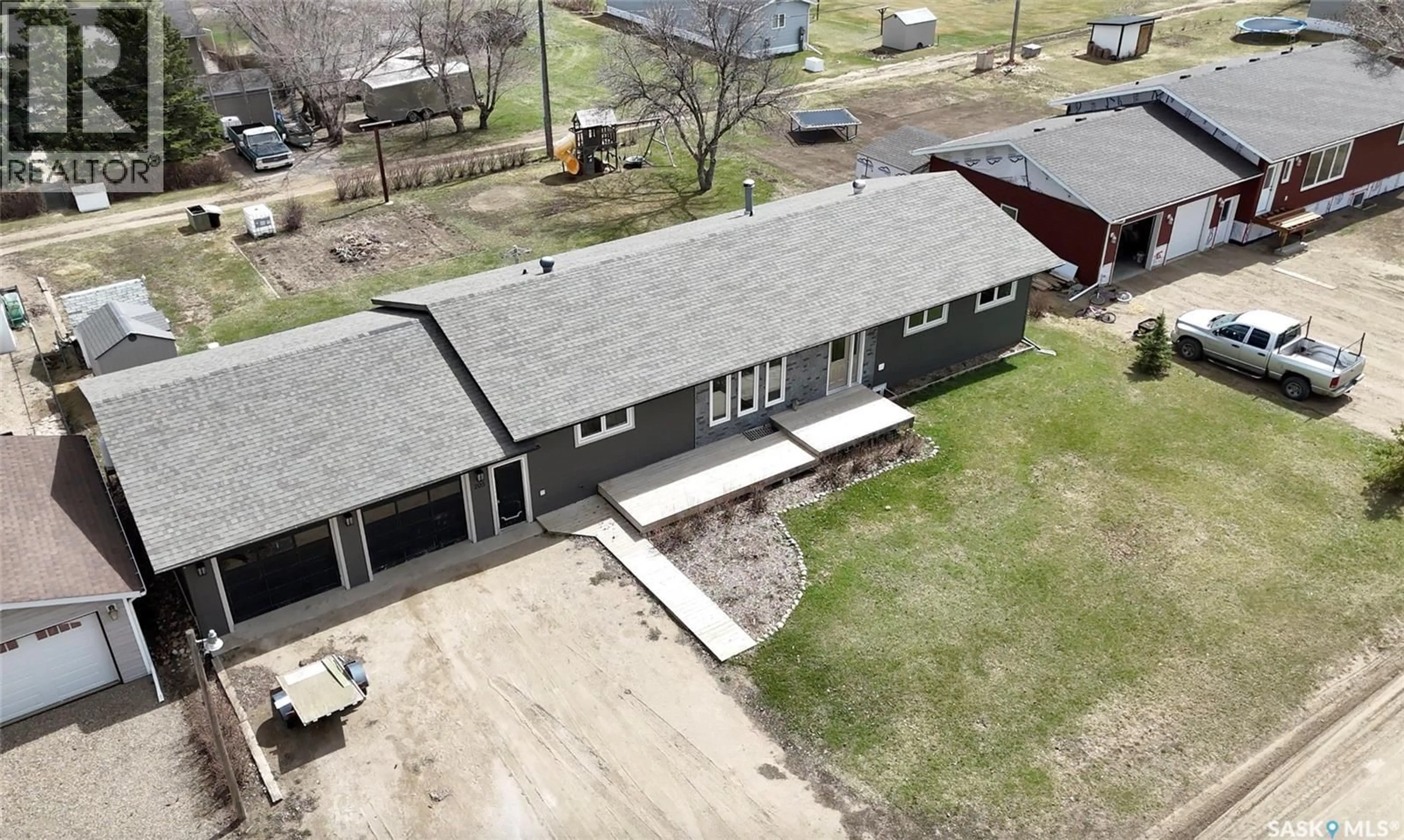 A pic from outside/outdoor area/front of a property/back of a property/a pic from drone, building for 205 CONQUEST STREET, Conquest Saskatchewan S0L0L0