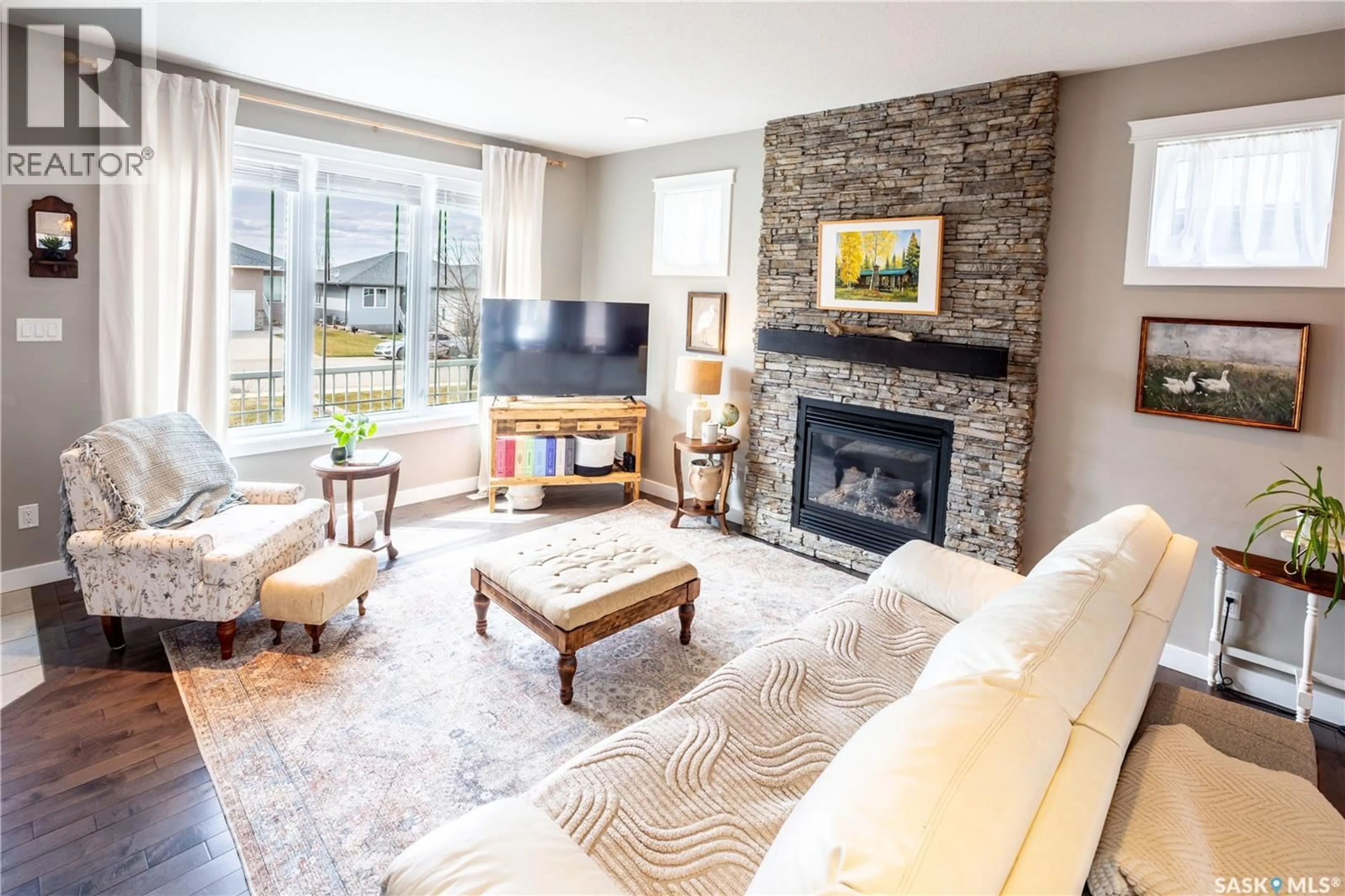 Living room with furniture, unknown for 132 EVERTON CRESCENT, Moose Jaw Saskatchewan S6K0A3