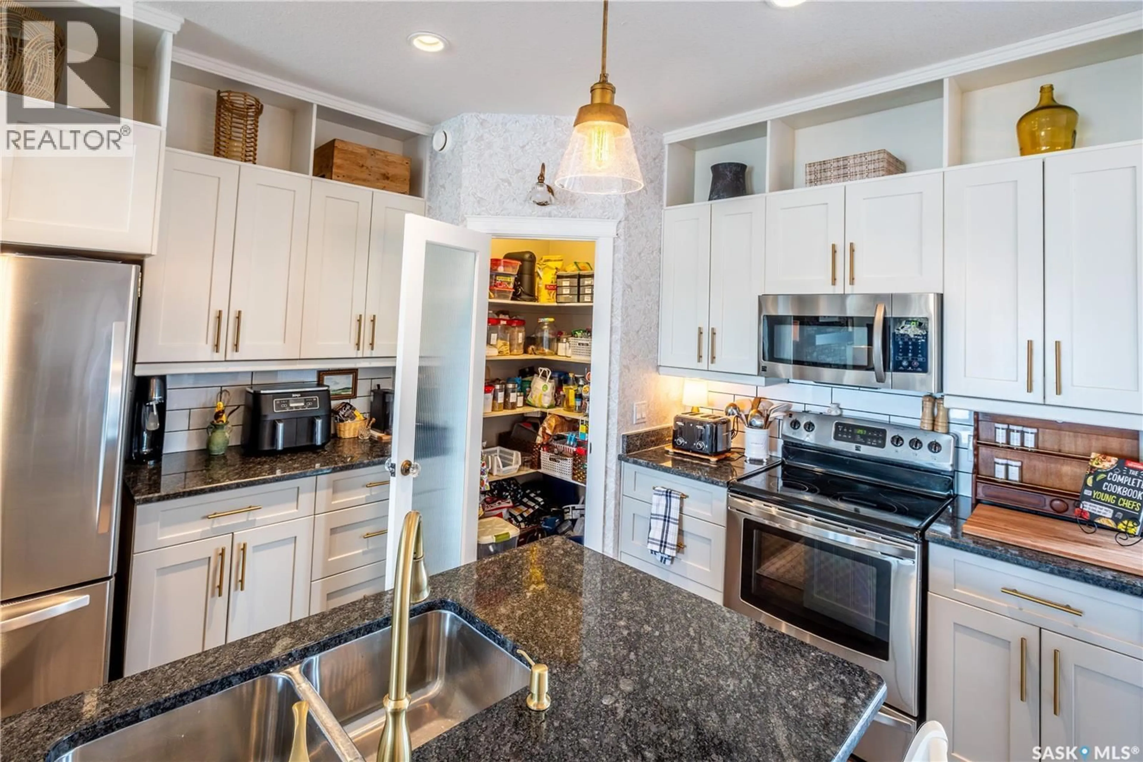 Open concept kitchen, ceramic/tile floor for 132 EVERTON CRESCENT, Moose Jaw Saskatchewan S6K0A3