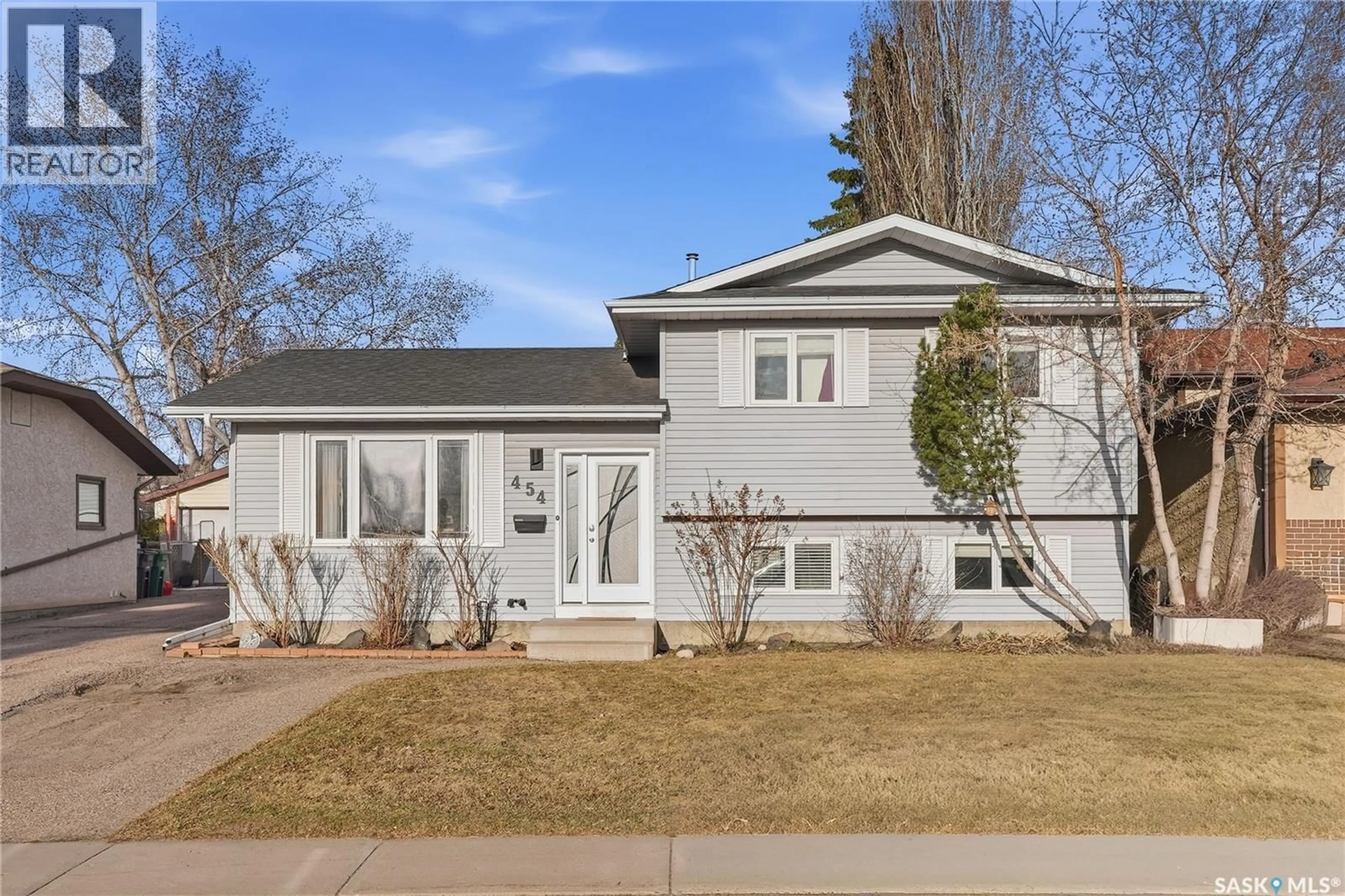 Home with vinyl exterior material, street for 454 KONIHOWSKI ROAD, Saskatoon Saskatchewan S7S1A4