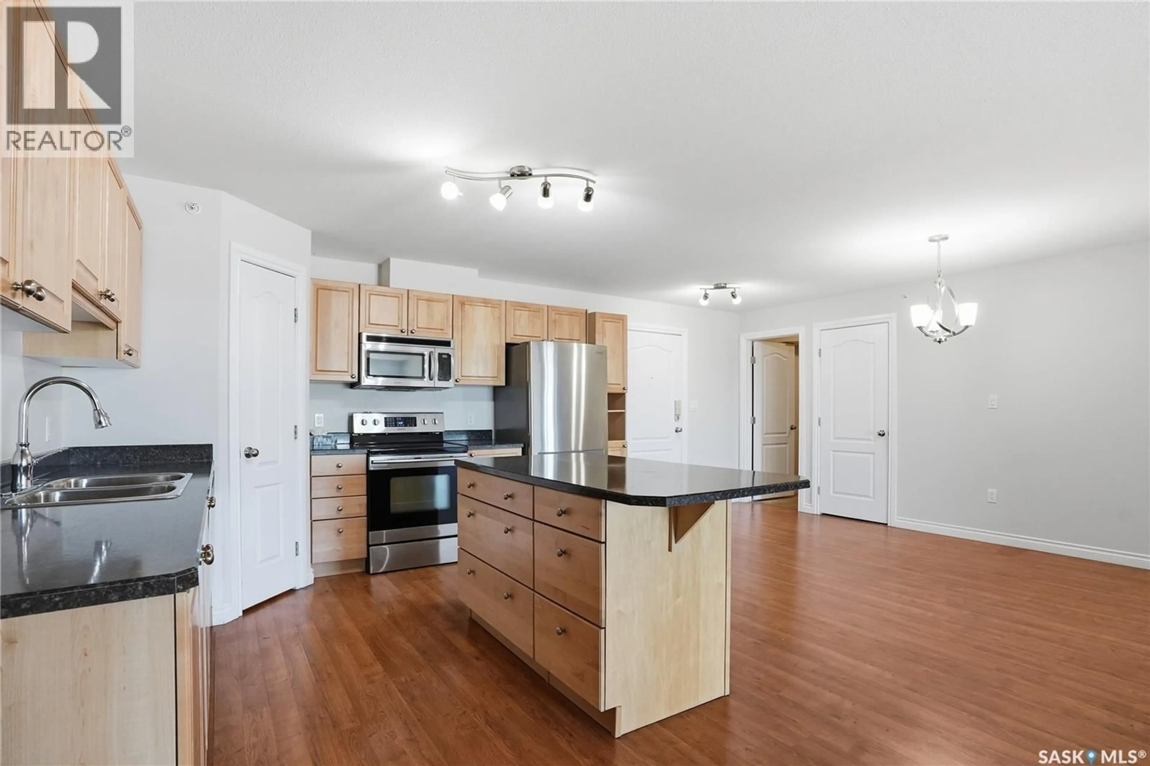 Open concept kitchen, unknown for 100 - 405 1ST AVENUE, Warman Saskatchewan S0K0A1