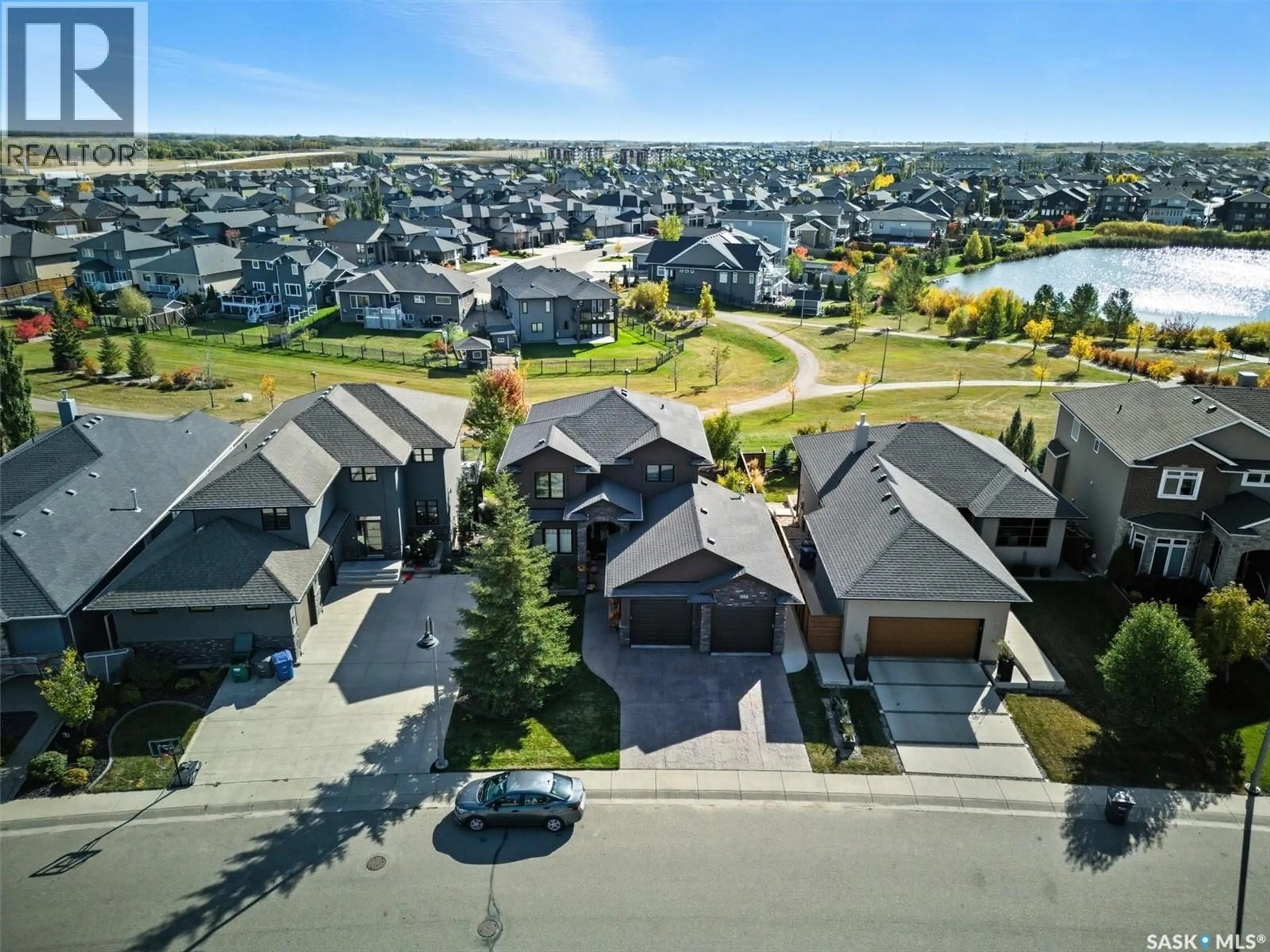 A pic from outside/outdoor area/front of a property/back of a property/a pic from drone, street for 258 WHALLEY CRESCENT, Saskatoon Saskatchewan S7T0P1