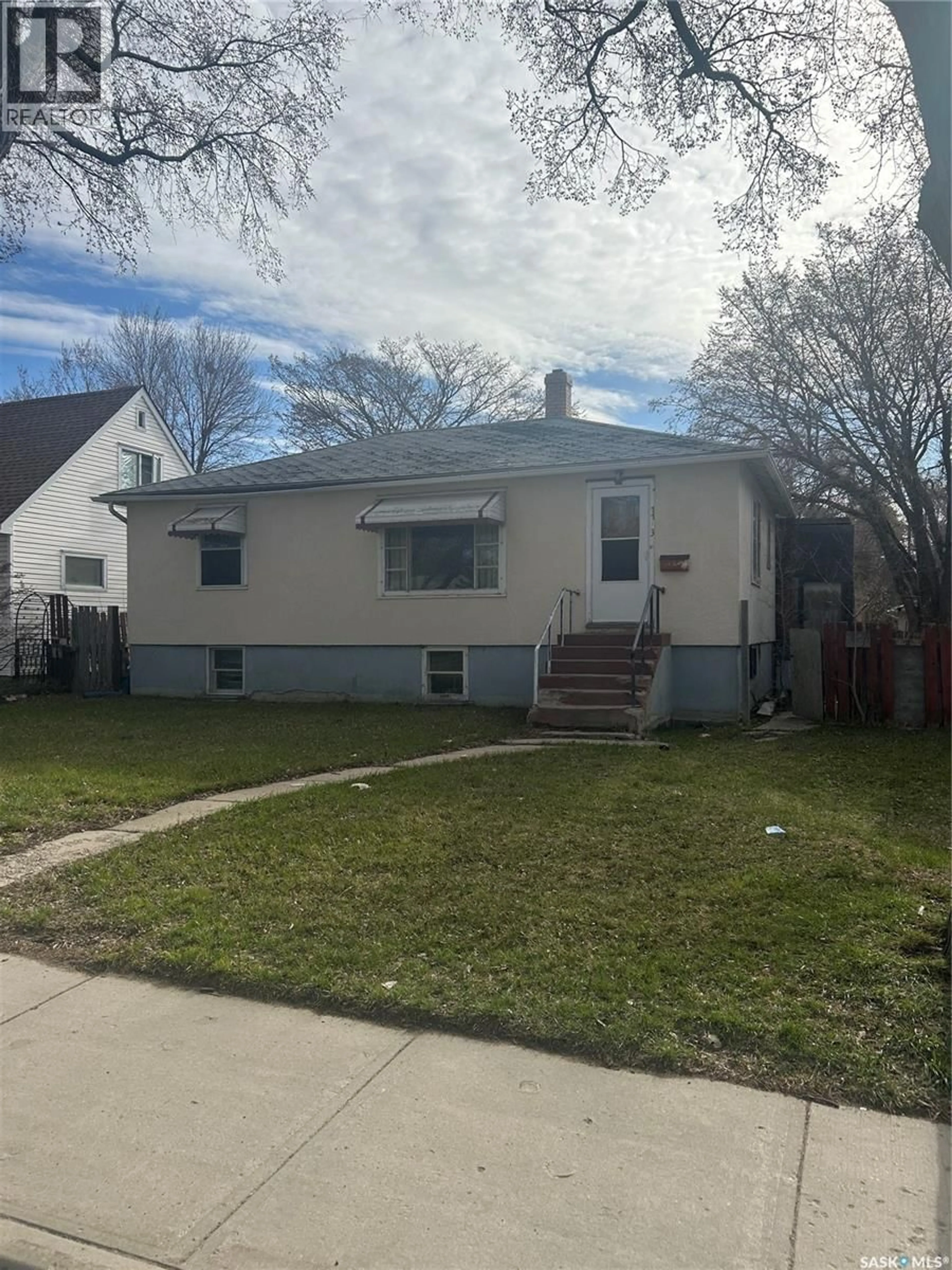 Home with vinyl exterior material, street for 1133 ELPHINSTONE STREET, Regina Saskatchewan S4T3M2