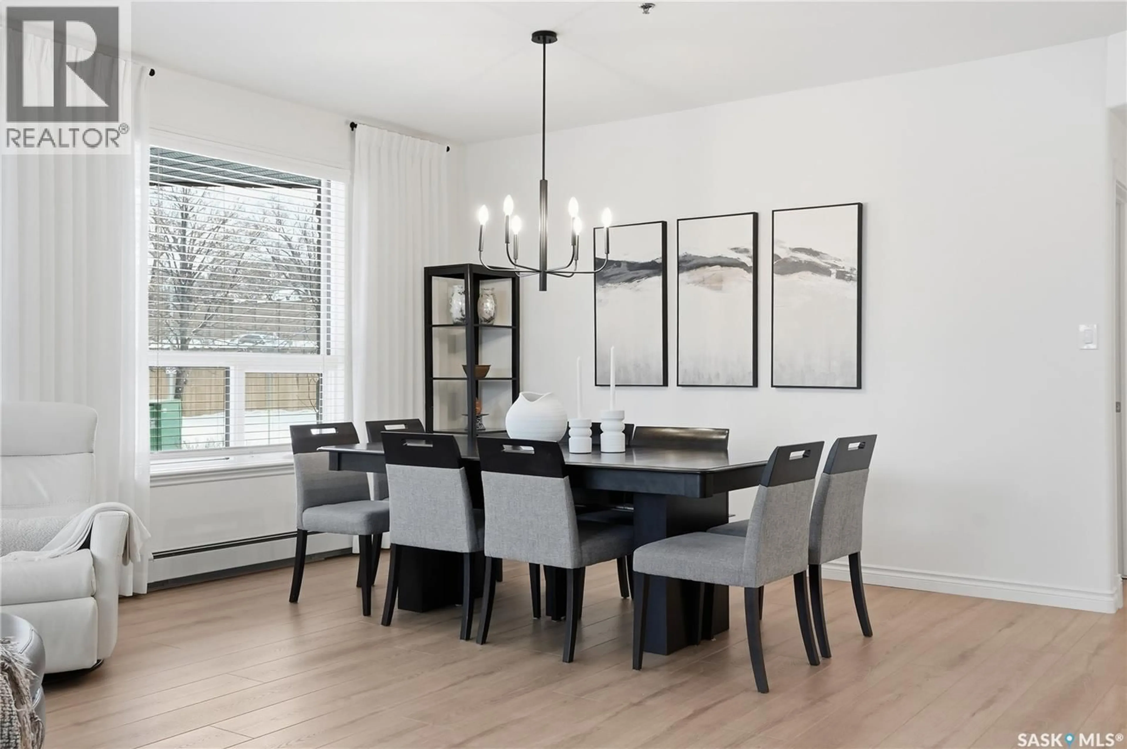 Dining room, wood/laminate floor for 111 619 SASKATCHEWAN CRESCENT, Saskatoon Saskatchewan S7M0A5